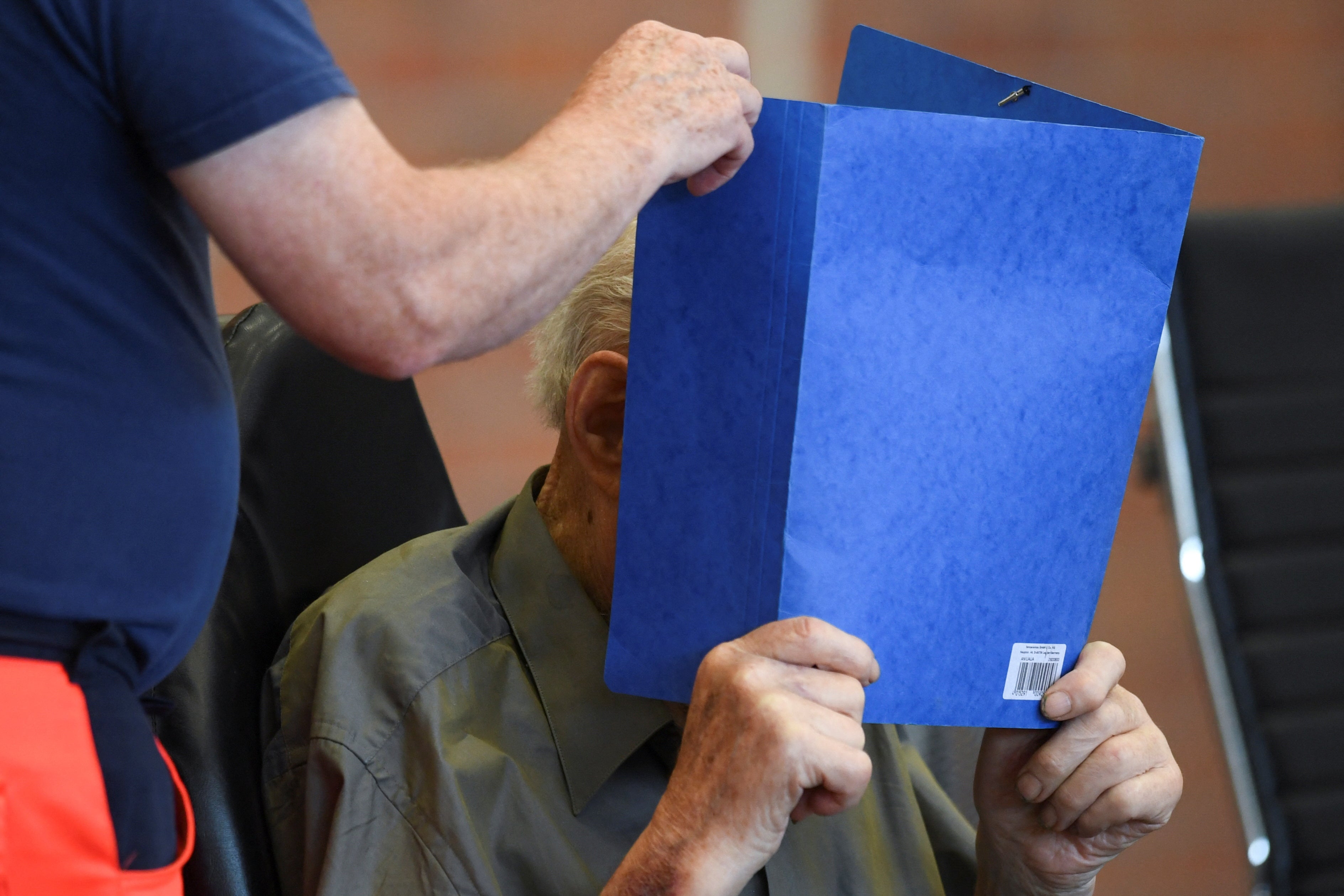 A 101-year-old former security guard of the Sachsenhausen concentration camp appears in the courtroom before his trial verdict