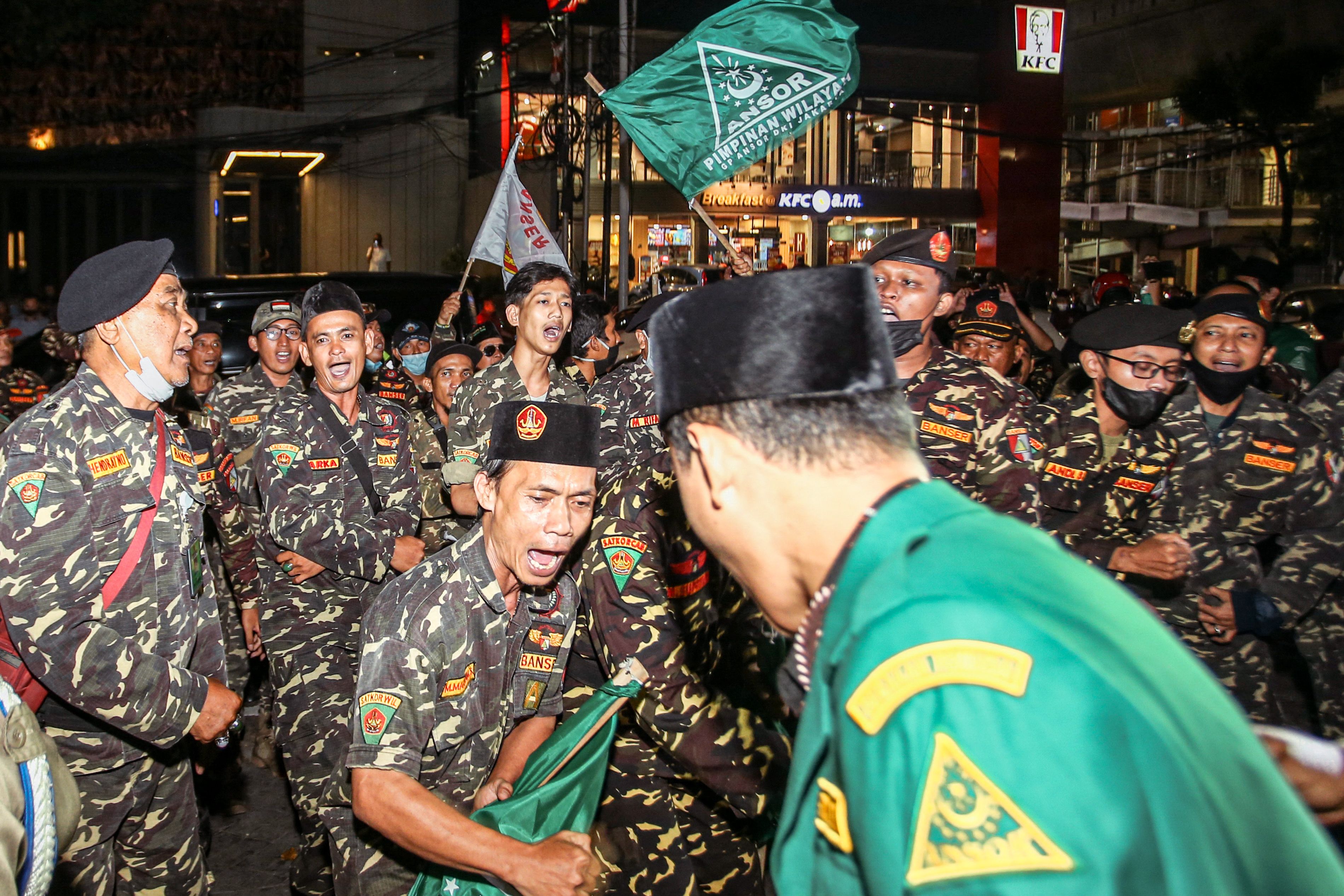 Members of an Islamic organisation protest in front of the Holywings bar in Jakarta on 24 June