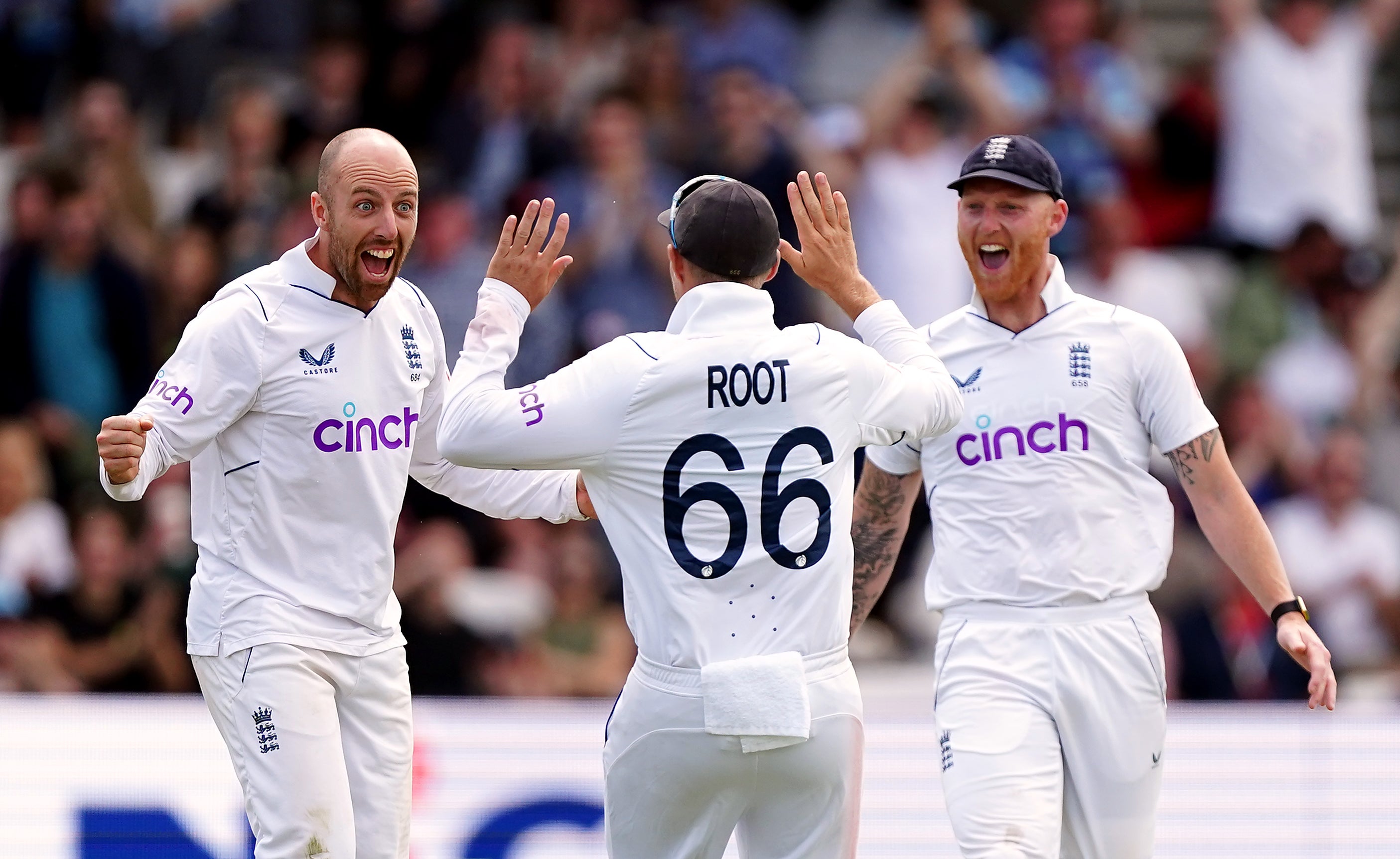 Ben Stokes (right) celebrates with Jack Leach and Joe Root at Headingley (Mike Egerton/PA).