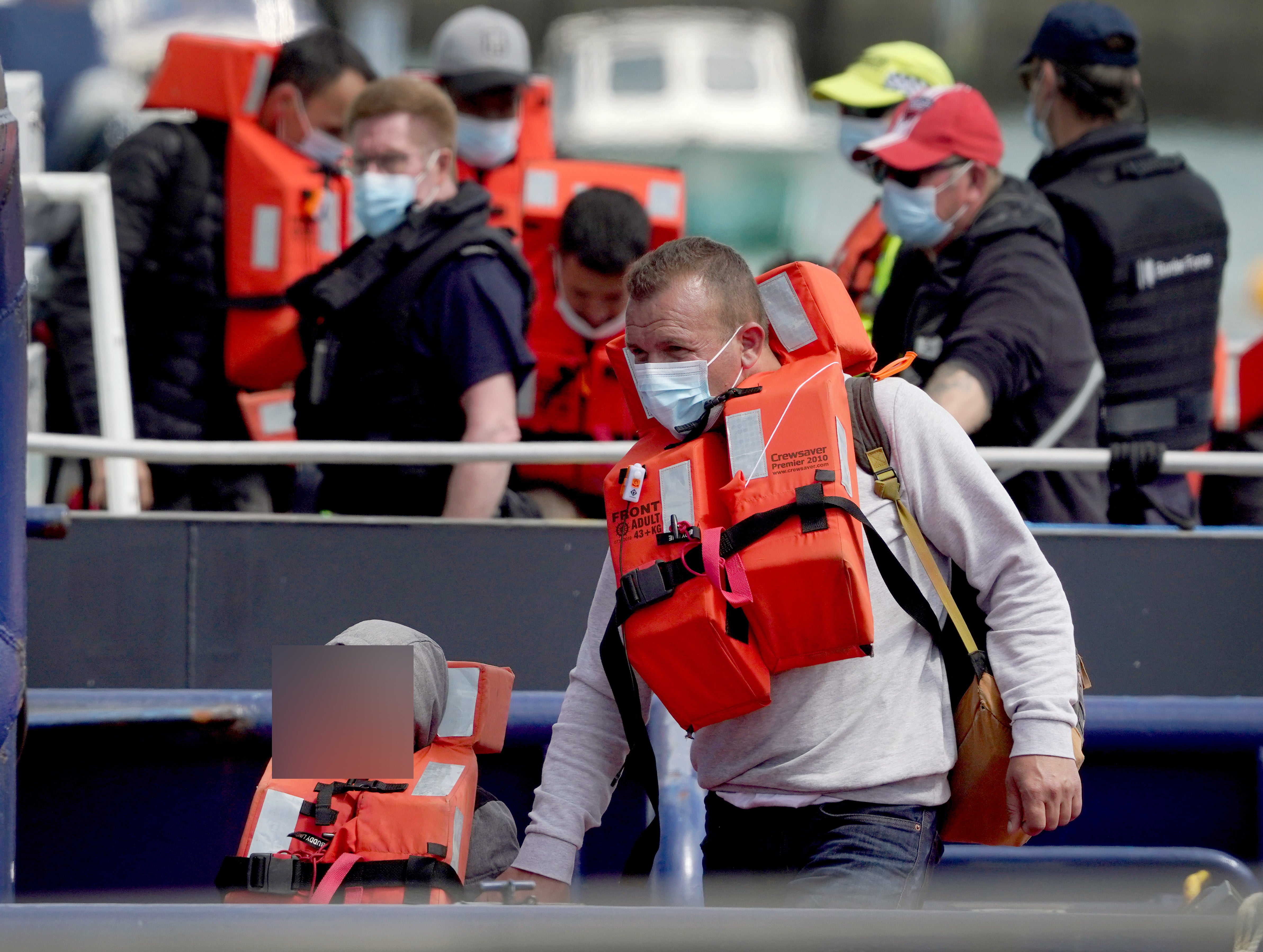 Migrants arriving in the UK (Gareth Fuller/PA)