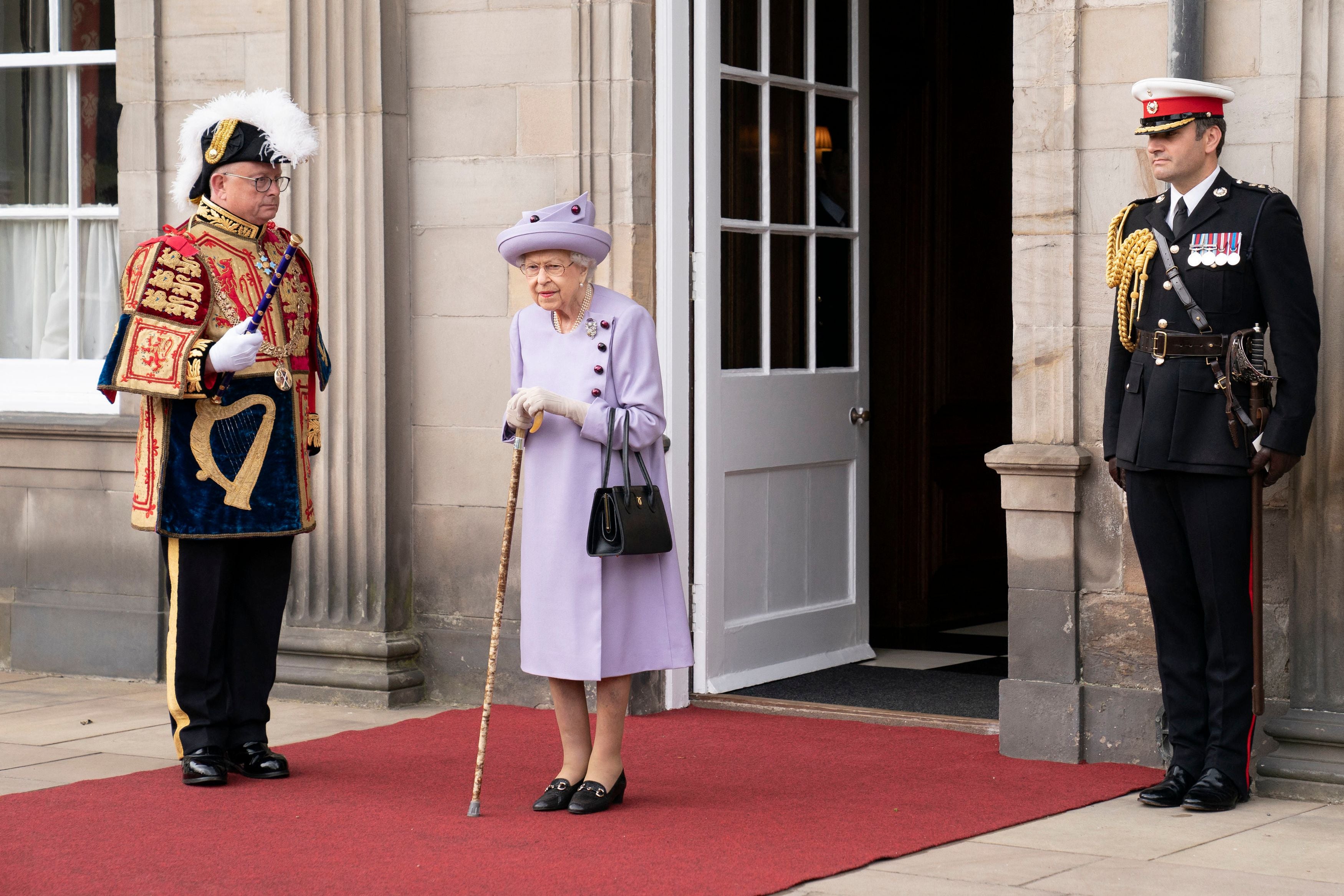 Queen Elizabeth II attends an Armed Forces Act of Loyalty Parade at the Palace of Holyroodhouse in Edinburgh