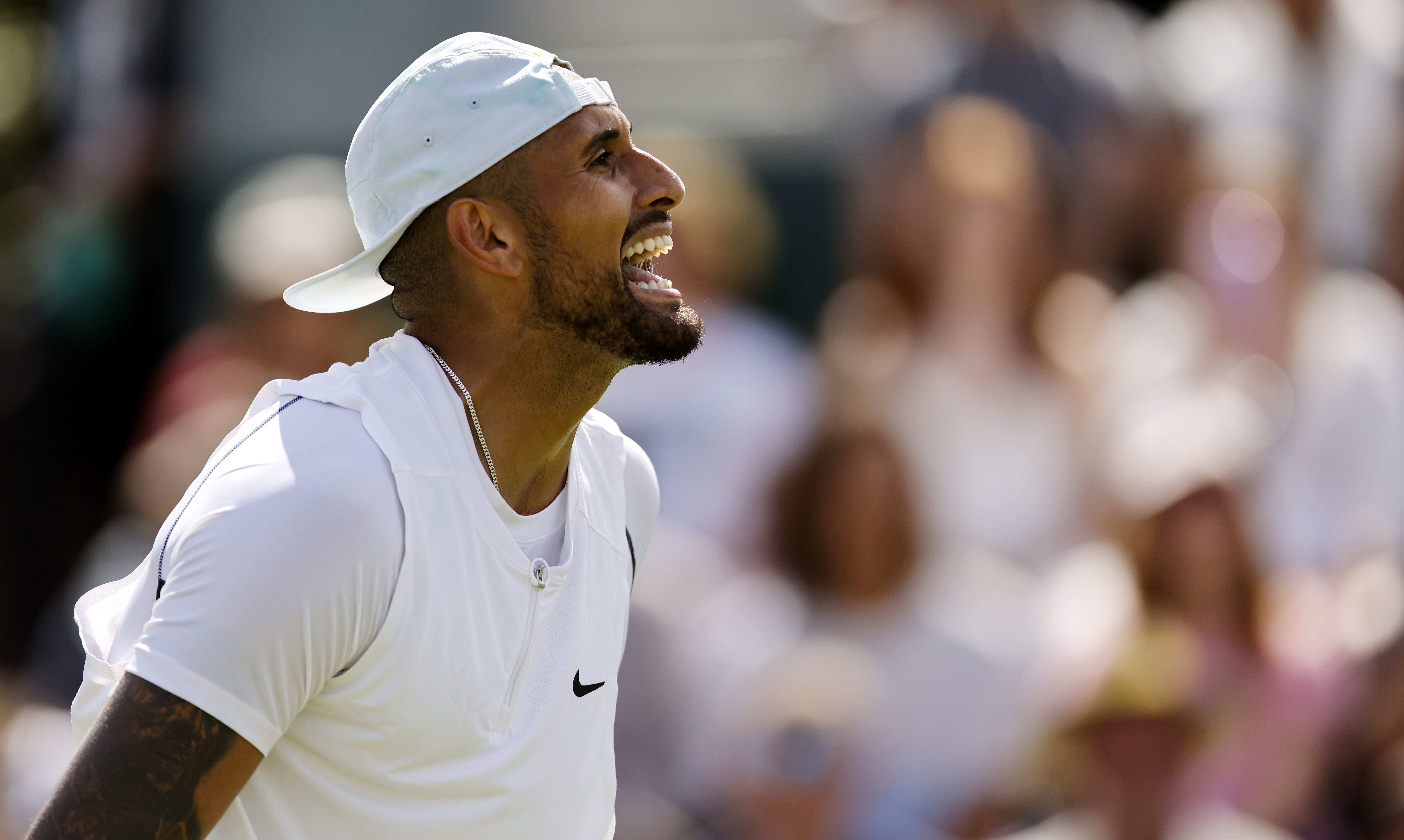 Nick Kyrgios of Australia reacts in the men's first round match against Paul Jubb