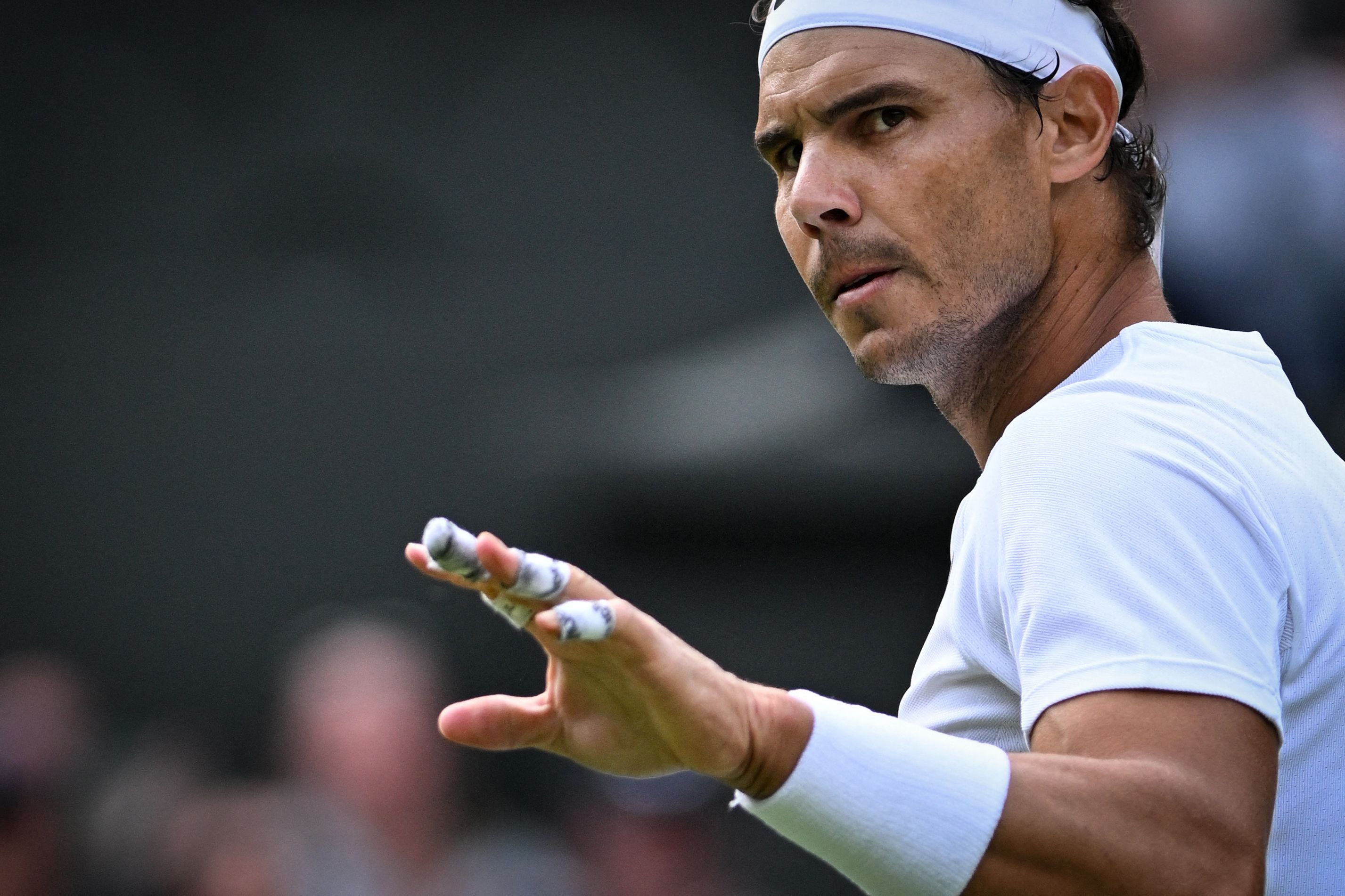 Spain's Rafael Nadal reacts as he plays against Argentina's Francisco Cerundolo