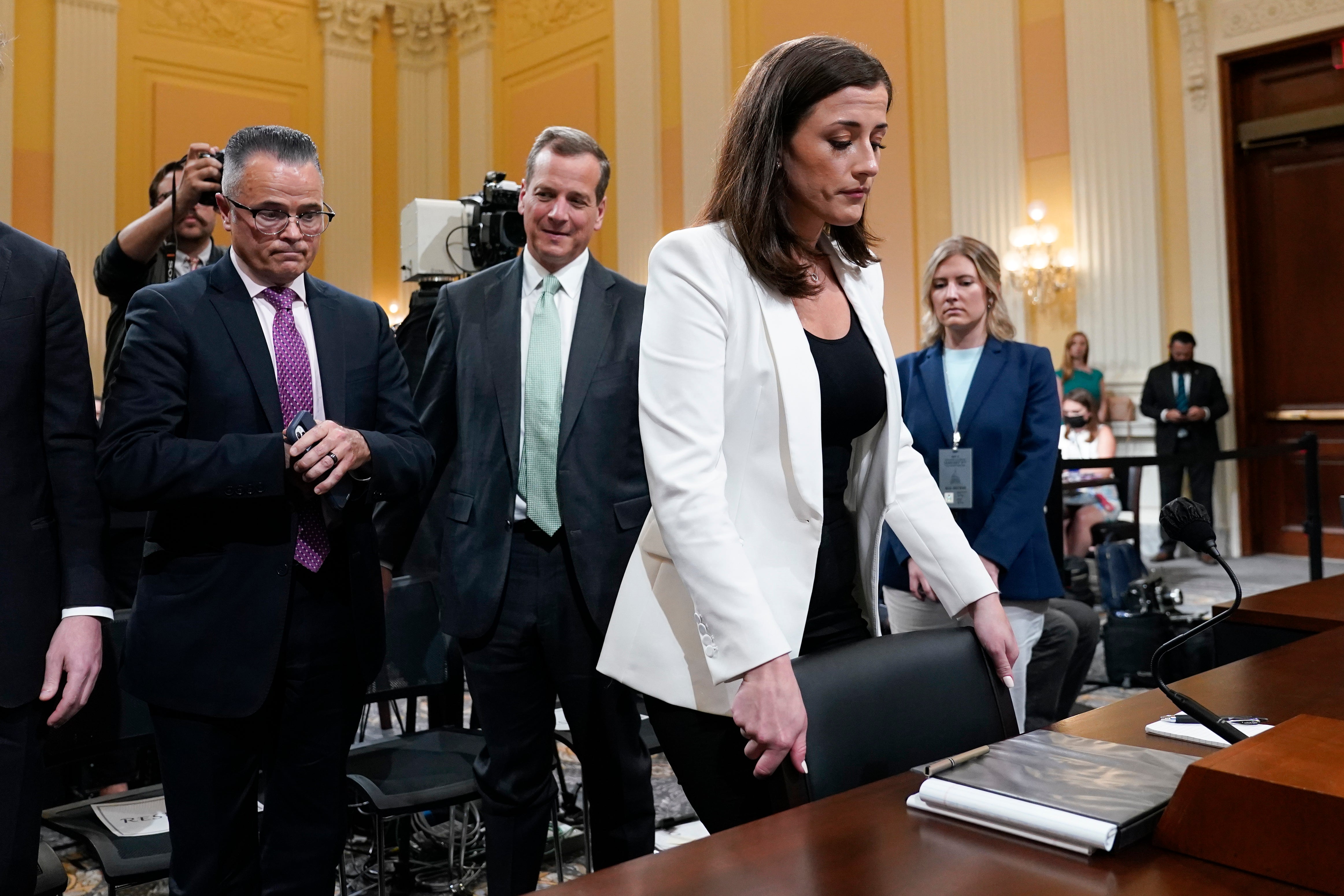 Cassidy Hutchinson, former aide to Trump White House chief of staff Mark Meadows, leaves after testifying