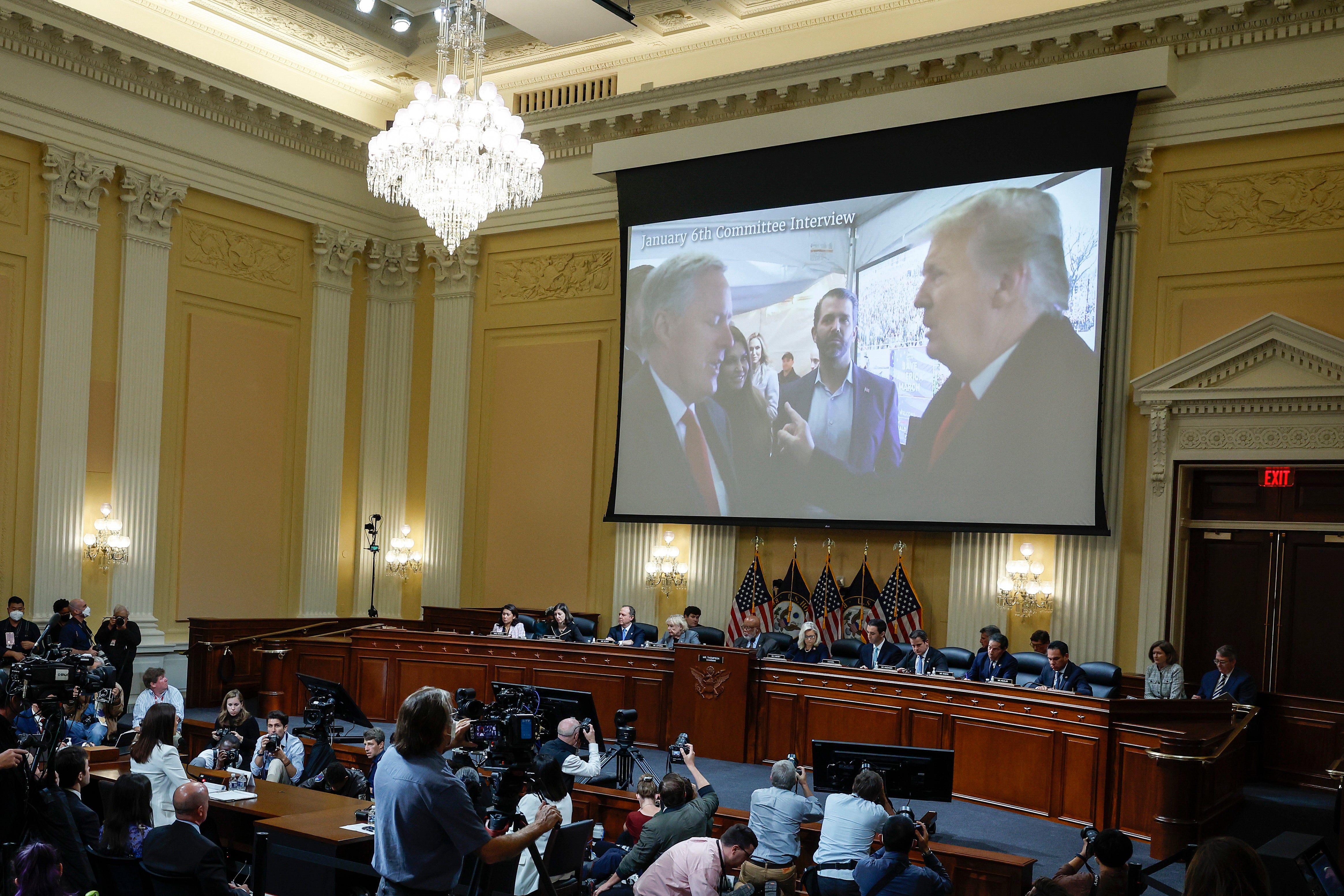 An image of former President Donald Trump talking to his chief of staff Mark Meadows is screened as Cassidy Hutchinson testifies to the committee