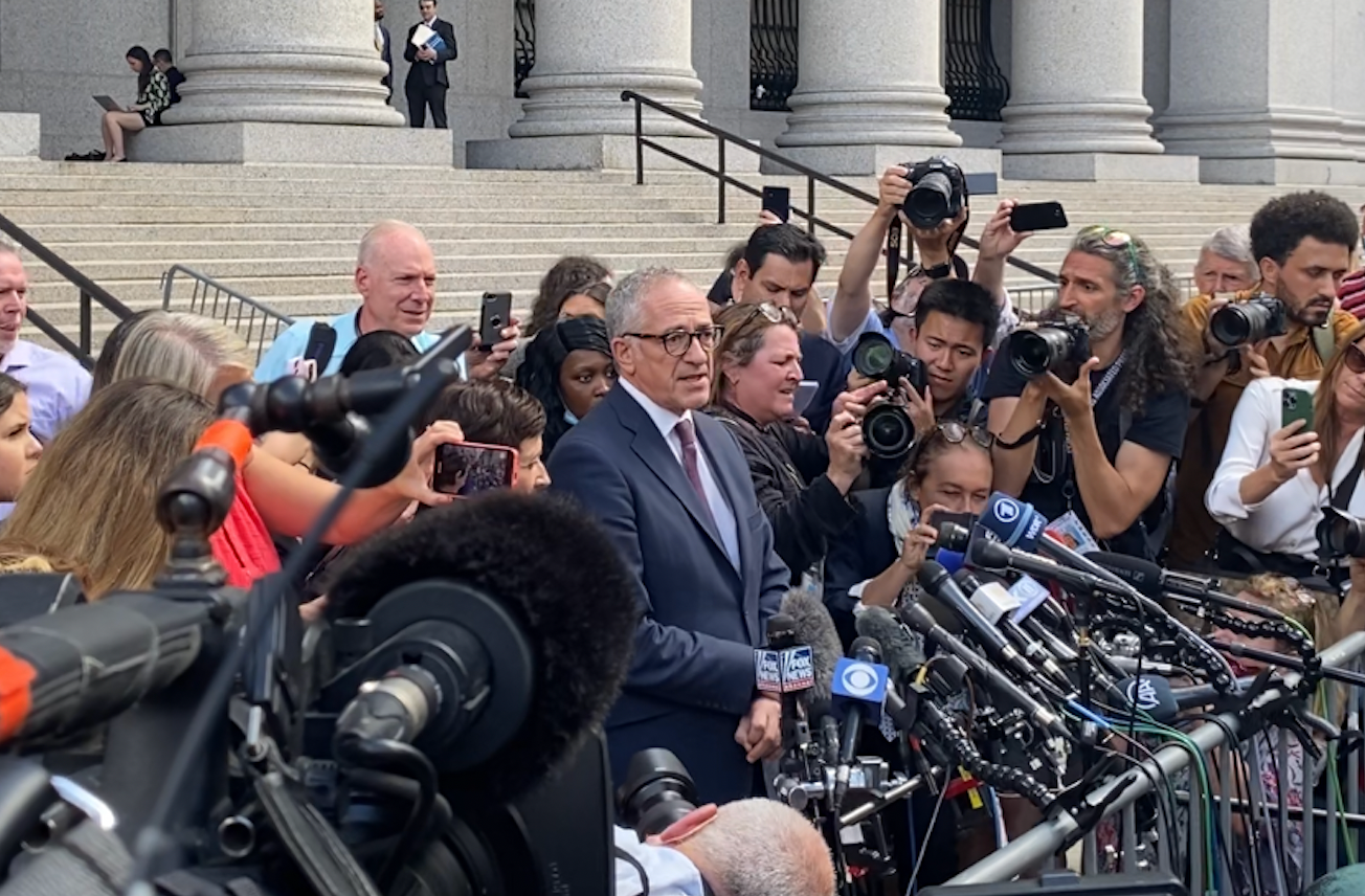 Kevin Maxwell, flanked by his twin sisters Christine and Isabel, addresses reporters outside court after Ghislaine Maxwell’s sentencing