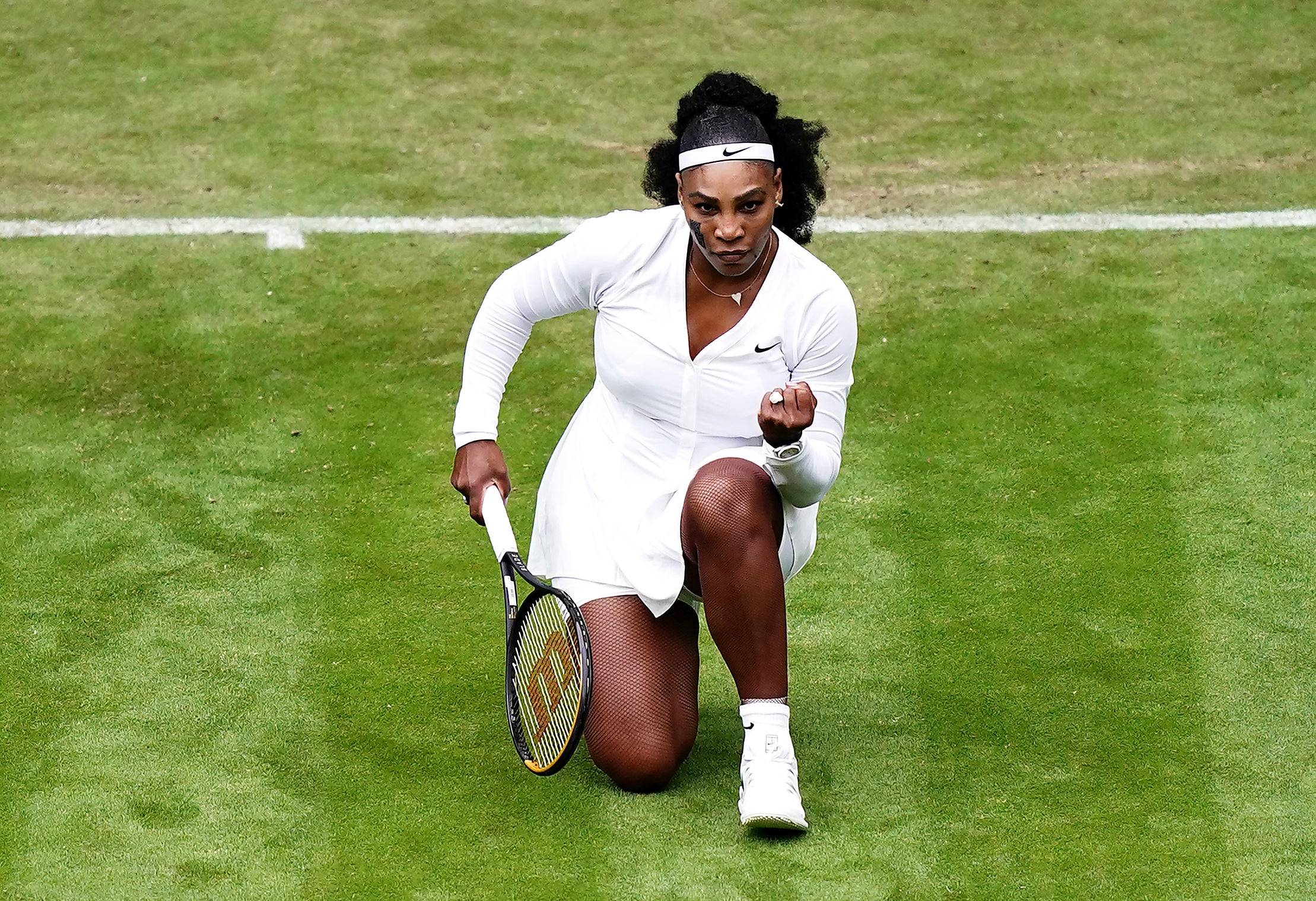 Serena Williams celebrates a point in the first set (Aaron Chown/PA)