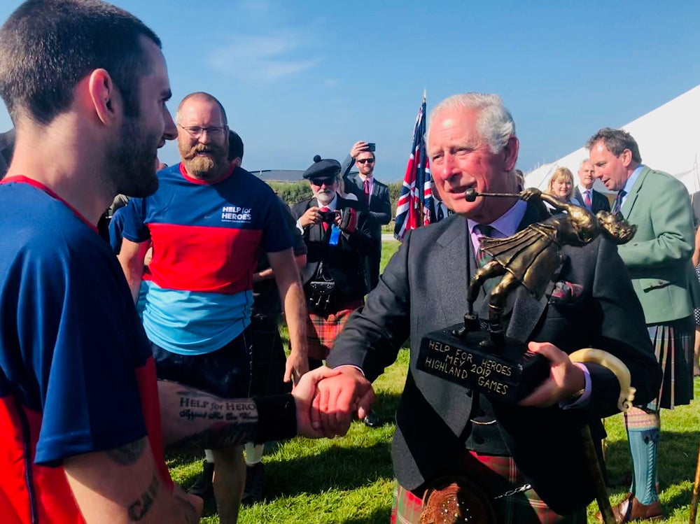 Prince Charles presenting Kieran Wood with a players player award at the Mey Games in John O’Groats in August 2019 (Help For Heroes/PA Real Life)