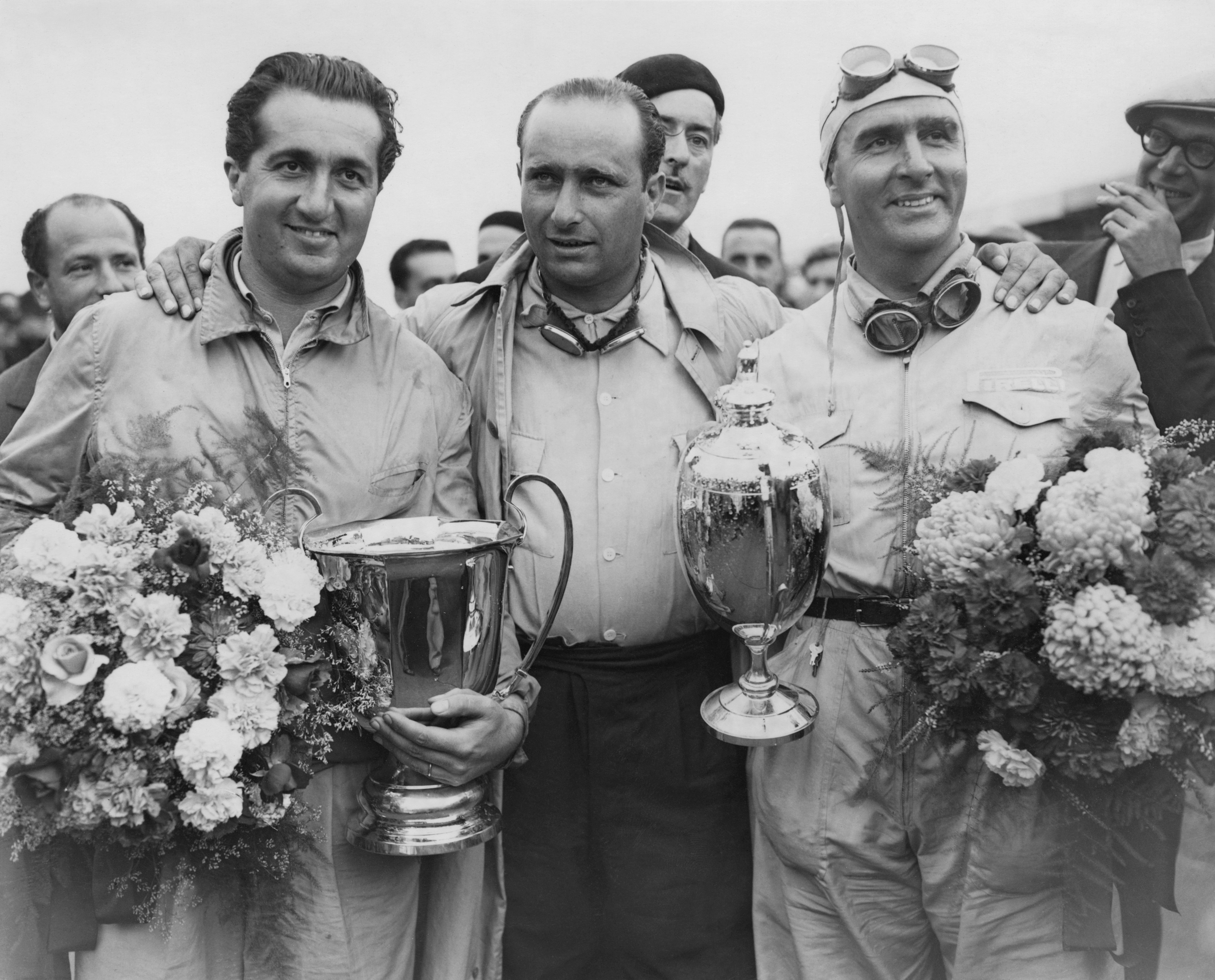 Silverstone, August 1950: Alberto Ascari, Juan Manuel Fangio and race winner Giuseppe ‘Nino’ Farina