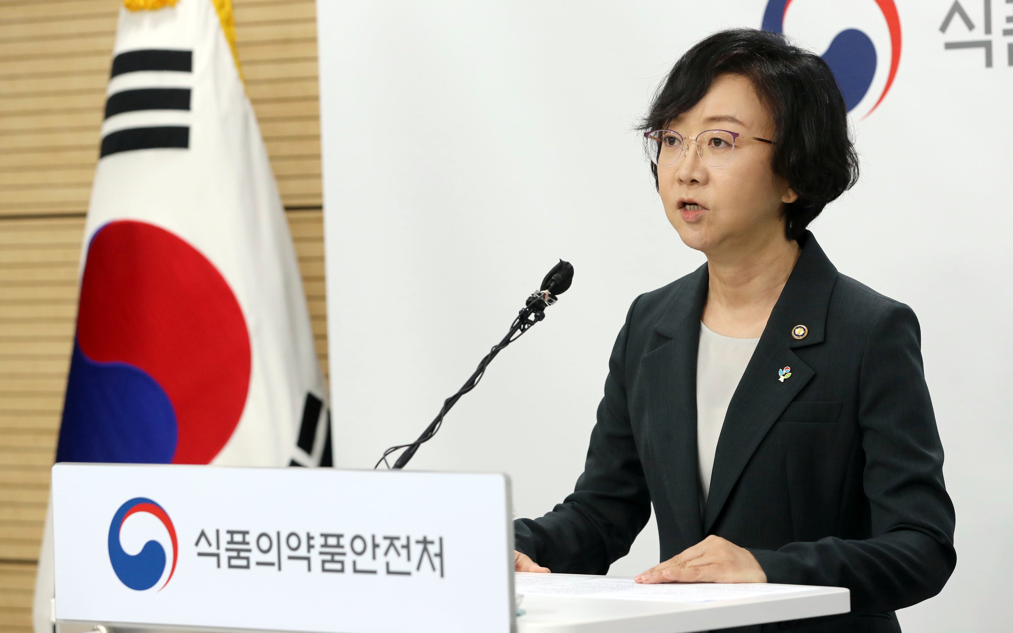 South Korean minister of food and drug safety Oh Yu-Kyoung speaks during a briefing in Cheongju