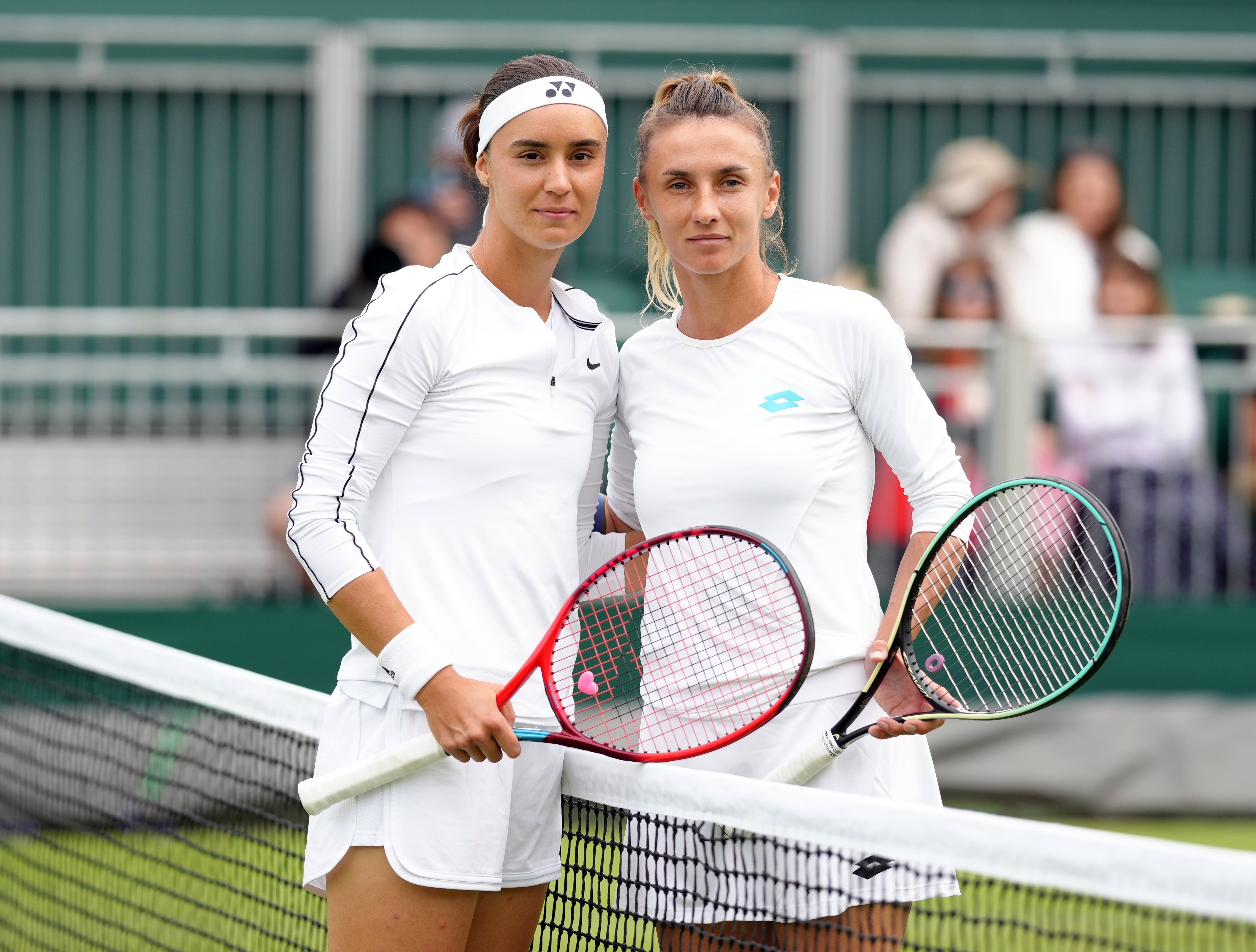 Anhelina Kalinina, left, and Lesia Tsurenko, right, before the match (John Walton/PA)