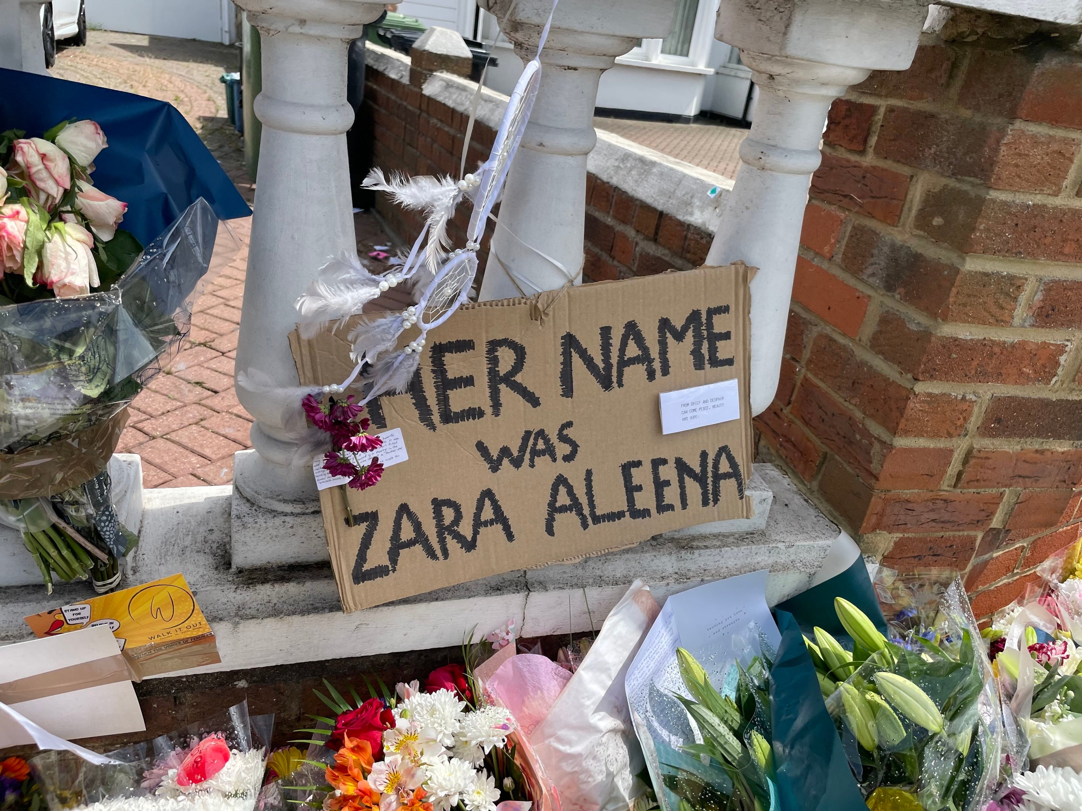 Floral tributes left at the scene on Cranbrook Road in Ilford, east London