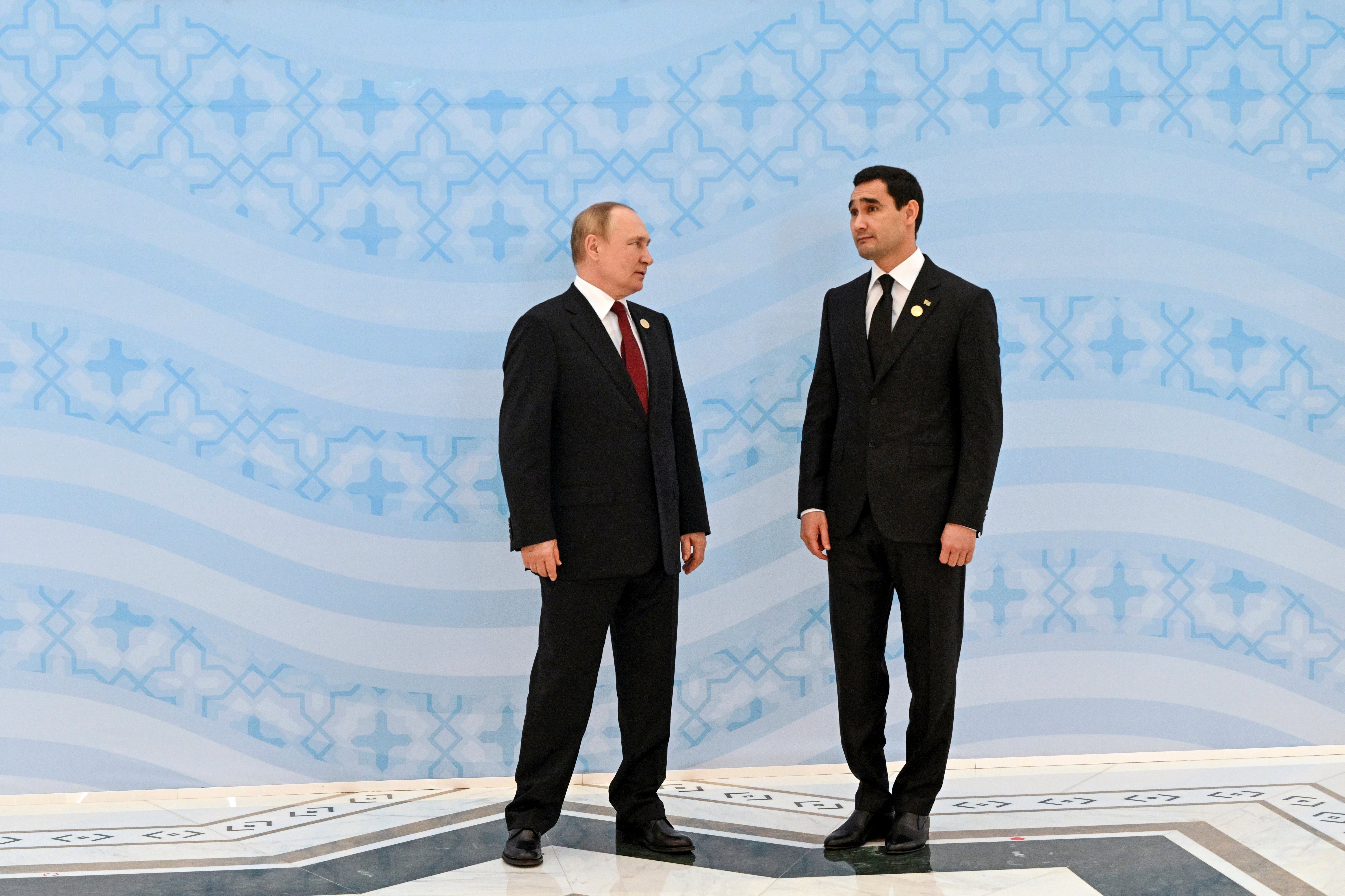Turkmenistan's President Serdar Berdymukhamedov, right, and Russian President Vladimir Putin pose for a photo on the sidelines of the Caspian Sea littoral states summit in Ashgabat, Turkmenistan, Wednesday, June 29, 2022. (Grigory Sysoyev, Sputnik, Kremlin Pool Photo via AP)