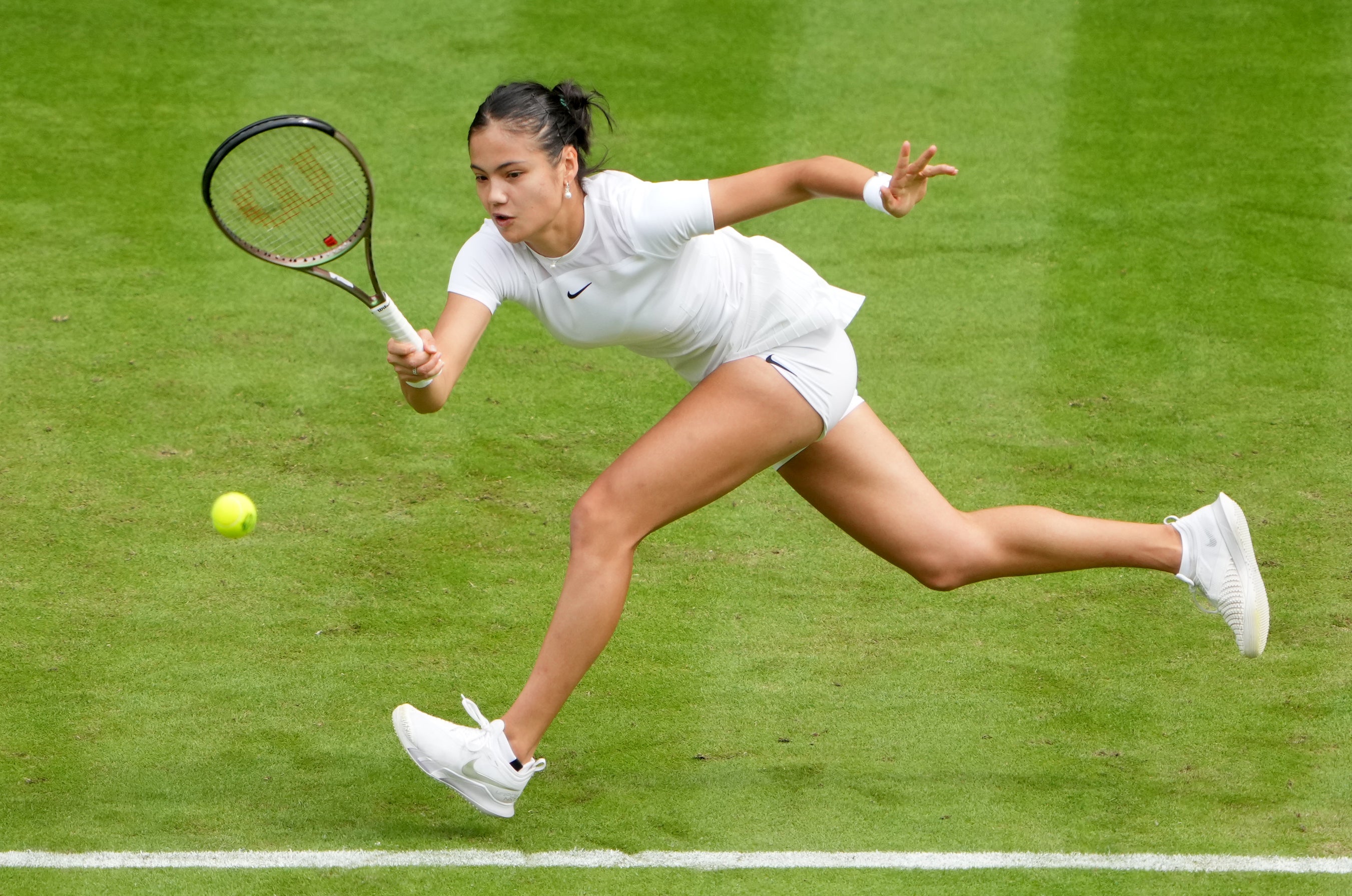 Emma Raducanu lunges for a forehand (Zac Goodwin/PA)