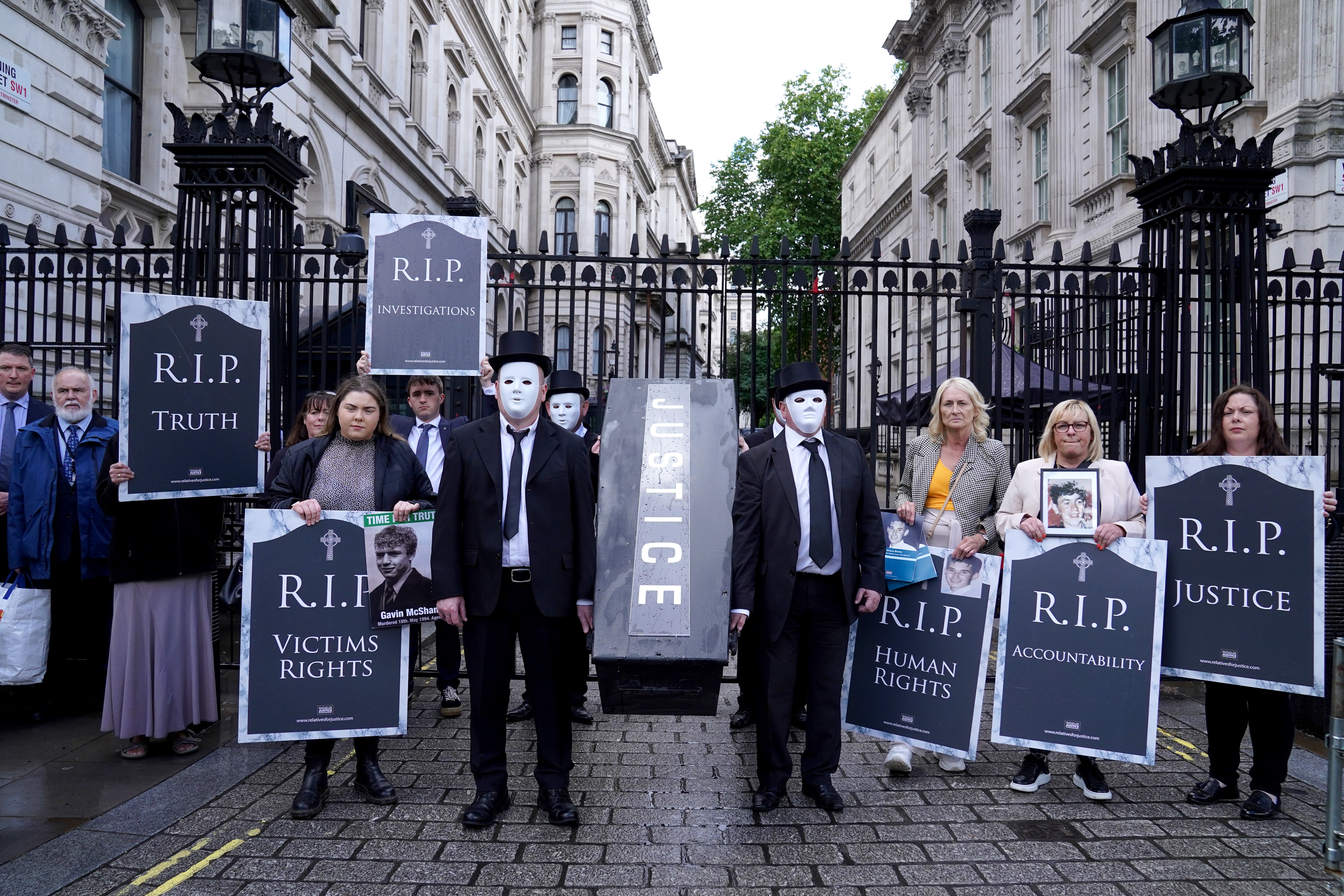 Representatives from Relatives for Justice, whose loved ones were murdered during the Troubles, protest in Parliament Square earlier this year (PA)