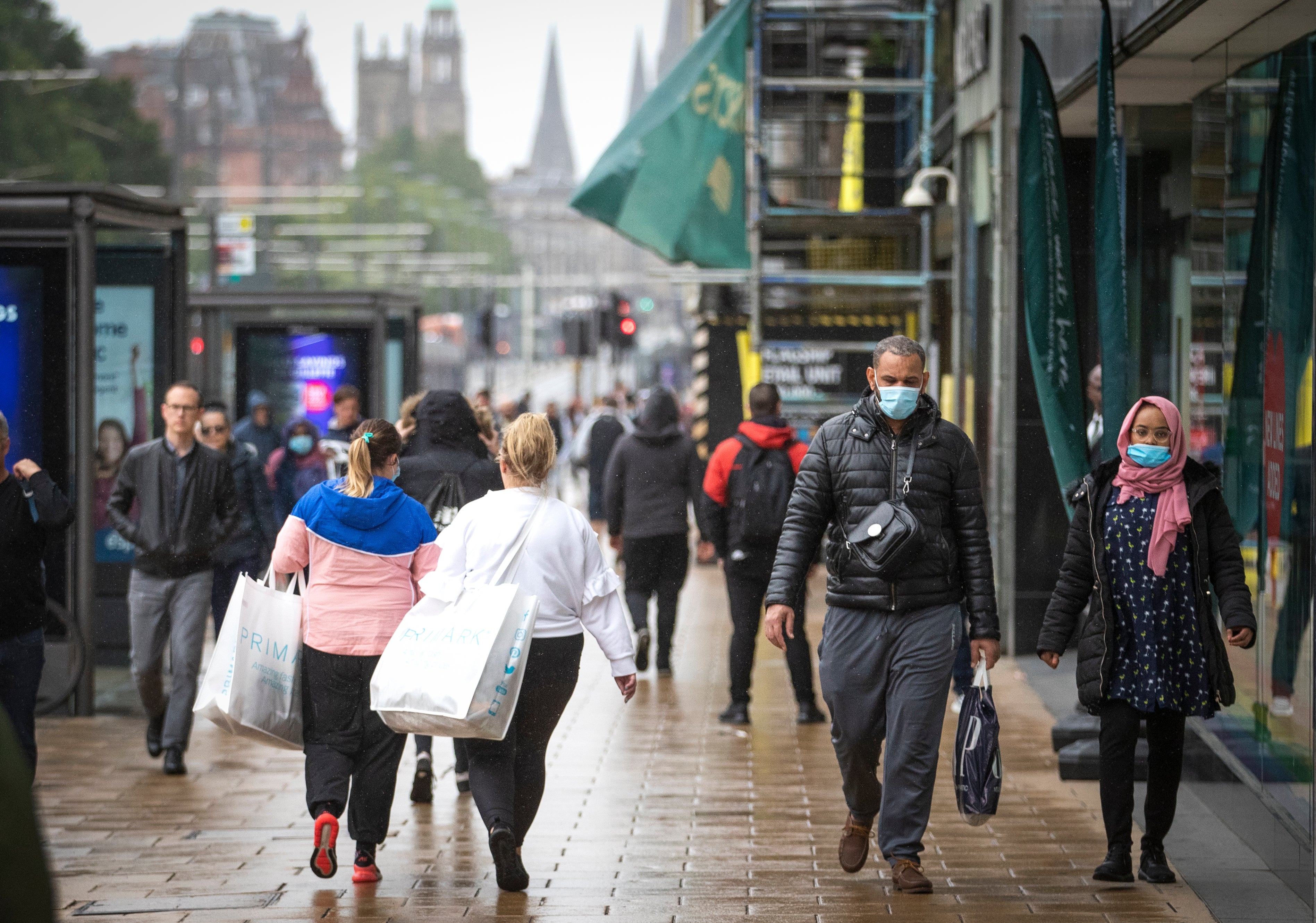 The think tank said more than half of people are starting to spend less on non-essential items (PA)