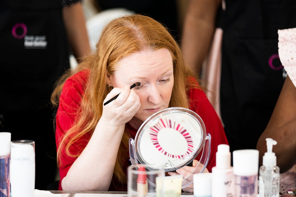 Karen Myers, 49, who was diagnosed with invasive ductal carcinoma (IDC) and high-grade ductal carcinoma in situ (DCIS) in July 2018, taking part in cancer support charity Look Good Feel Better photo shoot in August 2019 (Alicia Clarke/PA Real Life)