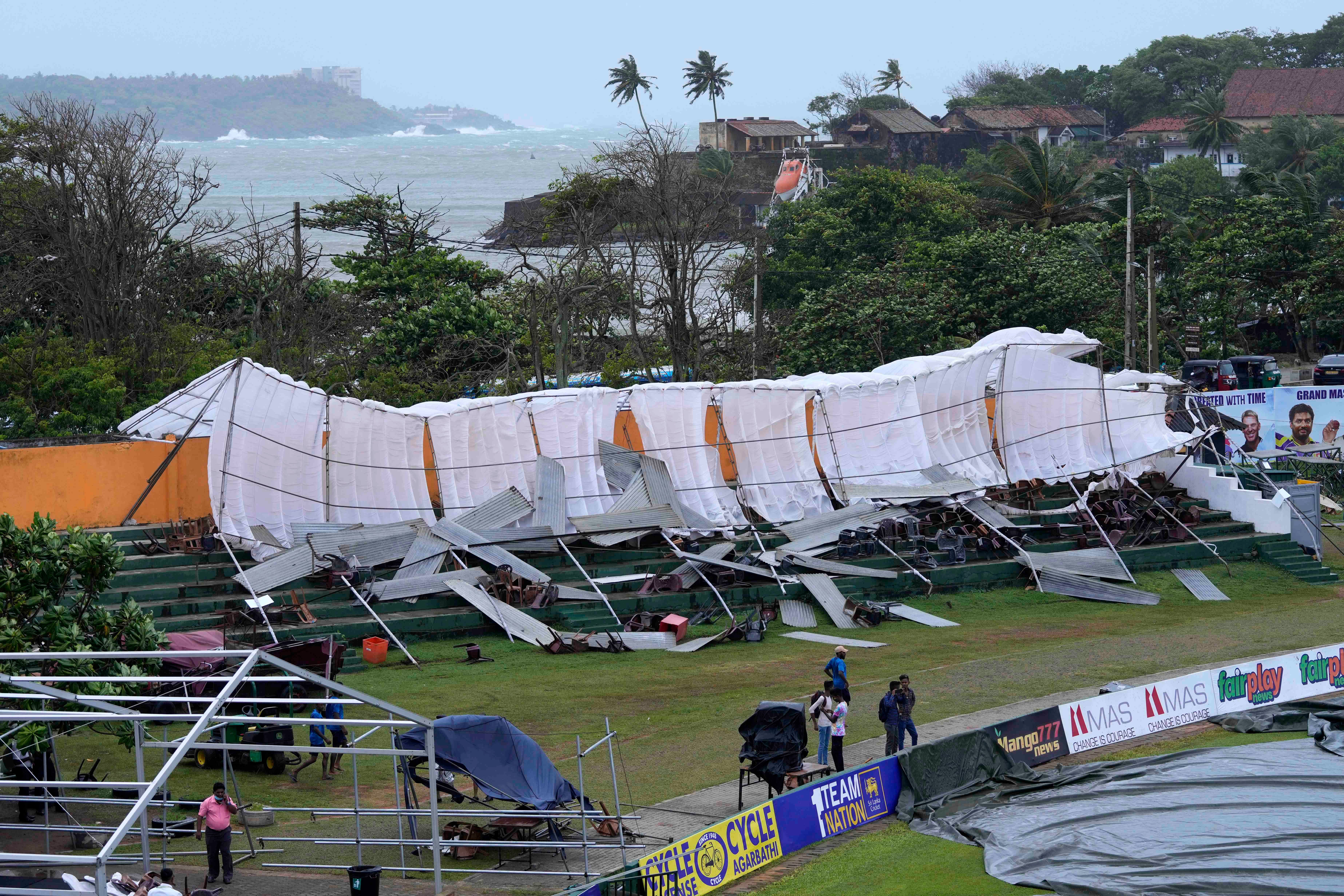 The roof of a makeshift spectator stand collapsed in Galle (Eranga Jayawardena/AP/PA)