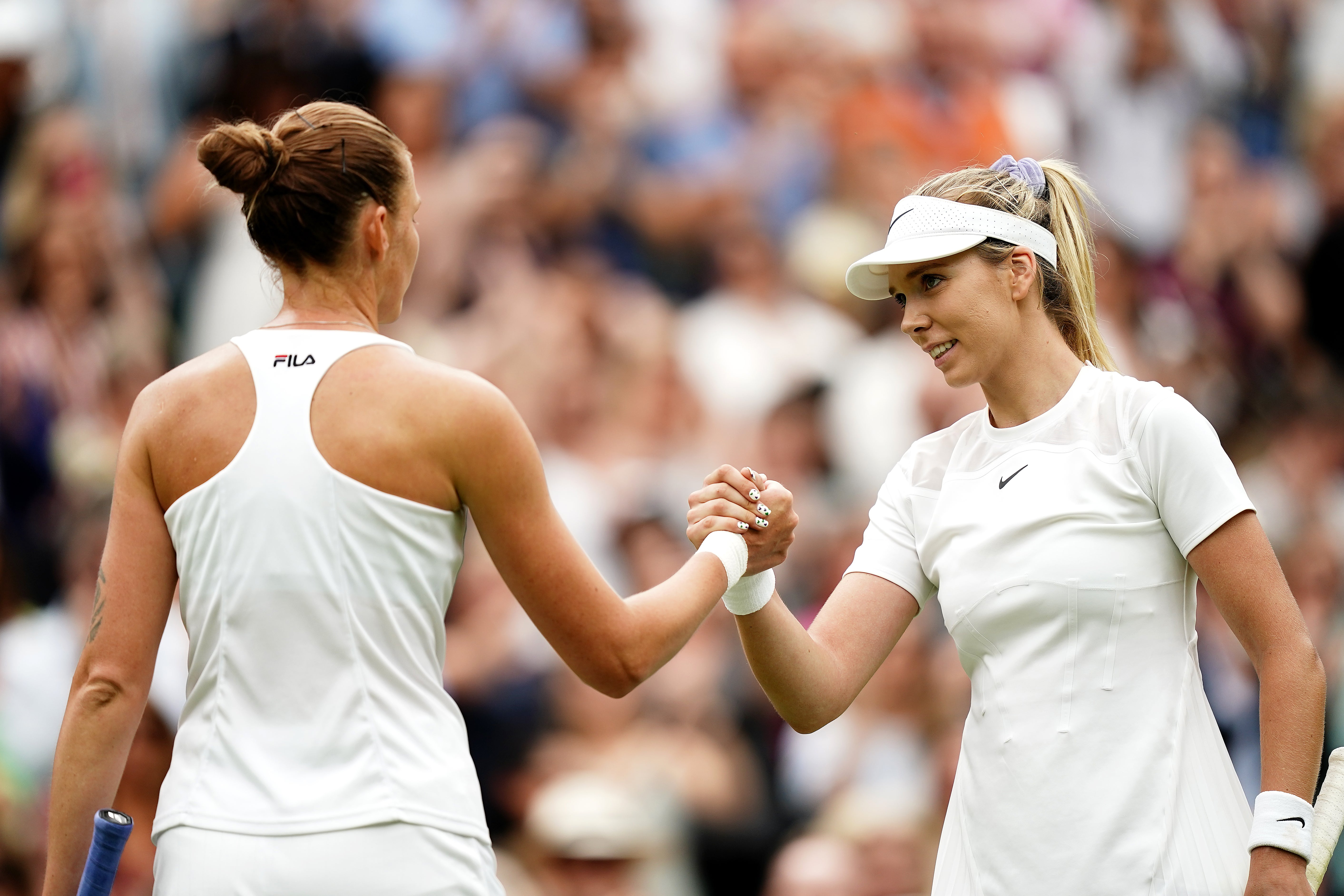 Katie Boulter (right) shakes hands with Karolina Pliskova (Aaron Chown/PA)