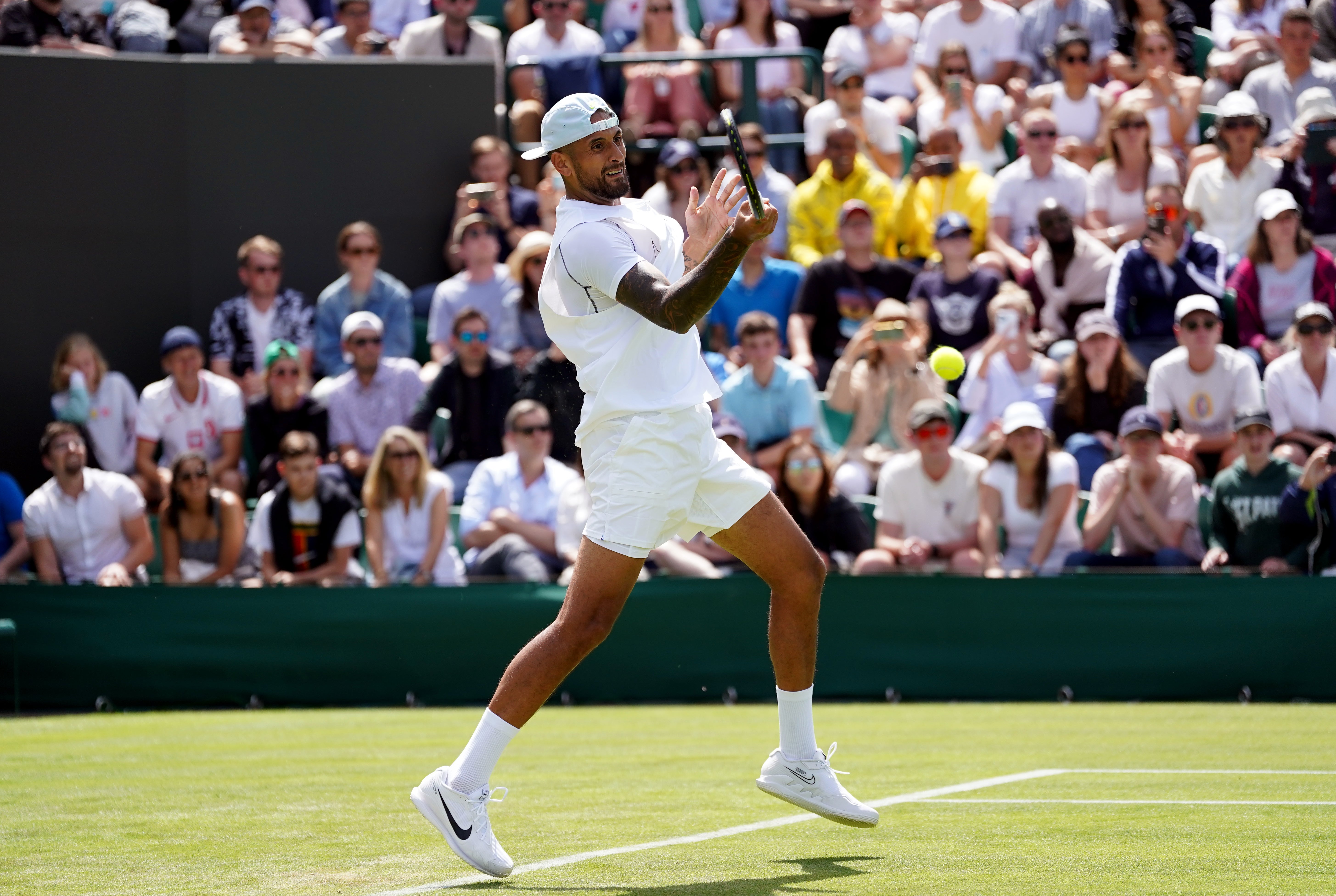 Nick Kyrgios during his match against Paul Jubb on day two of the 2022 Wimbledon Championships (Adam Davy/PA)