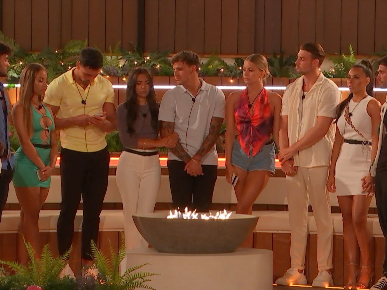 Love Islanders gather around the fire pit during Thursday 30 June’s episode