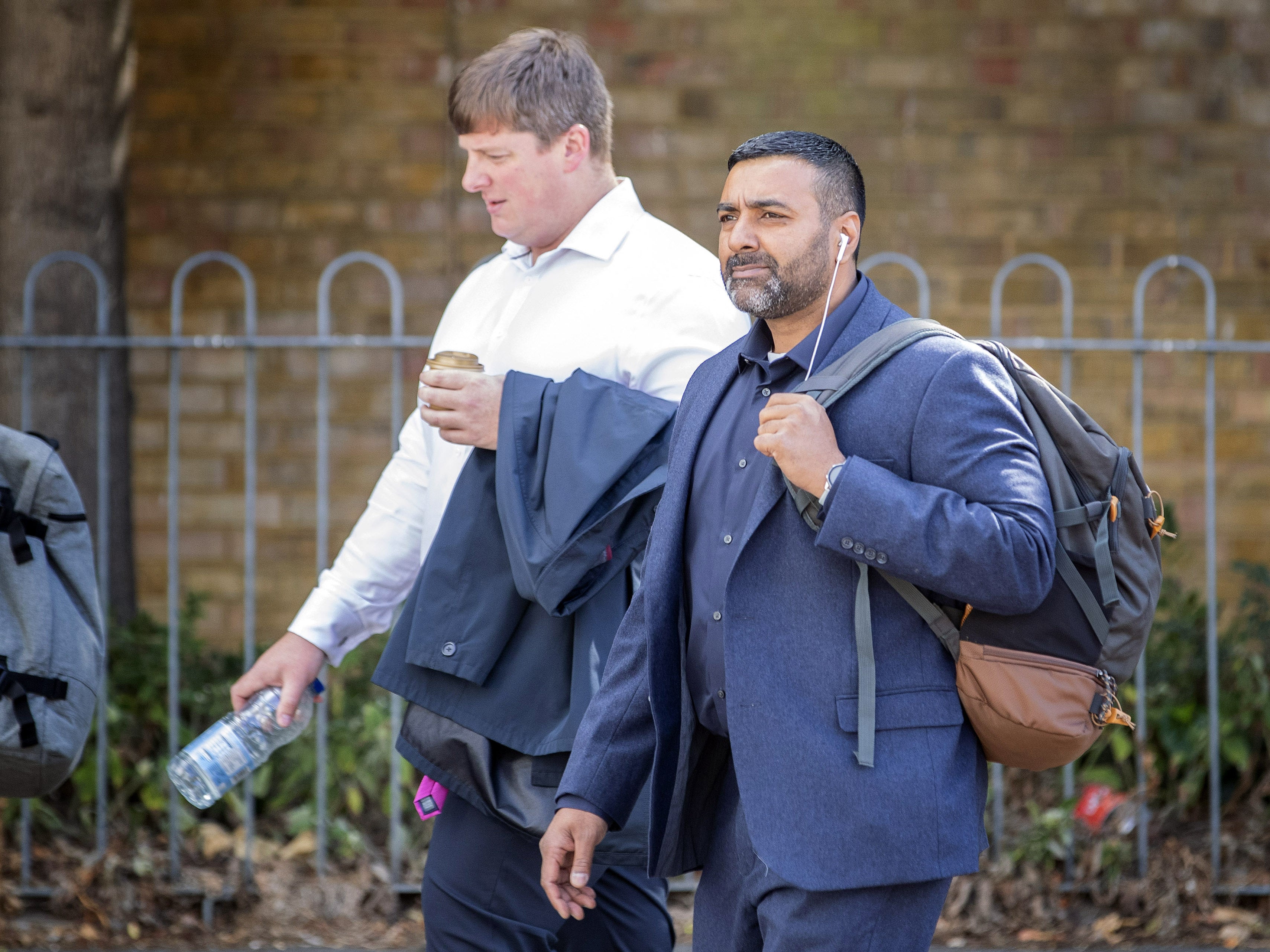 Pc Sukhdev Jeer (right) and Pc Paul Hefford arriving for a misconduct hearing (PA)