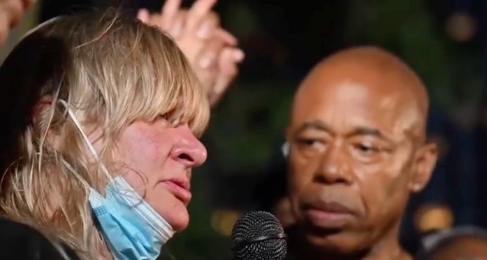 Azsia Johnson’s mother Lisa Desort speaks alongside Eric Adams at a vigil on Thursday night