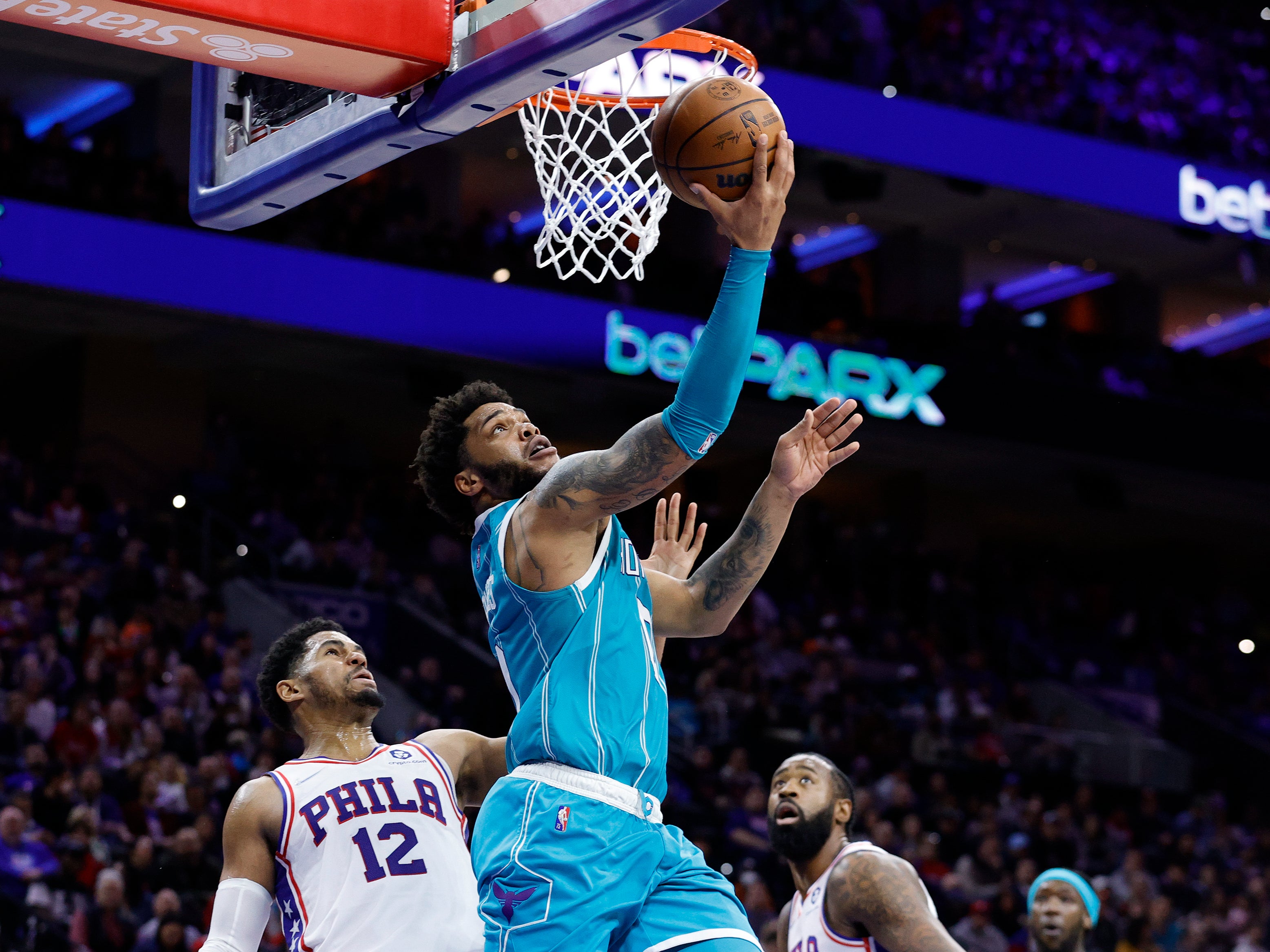 Miles Bridges #0 of the Charlotte Hornets shoots a lay up against the Philadelphia 76ers at Wells Fargo Center on April 02, 2022 in Philadelphia, Pennsylvania