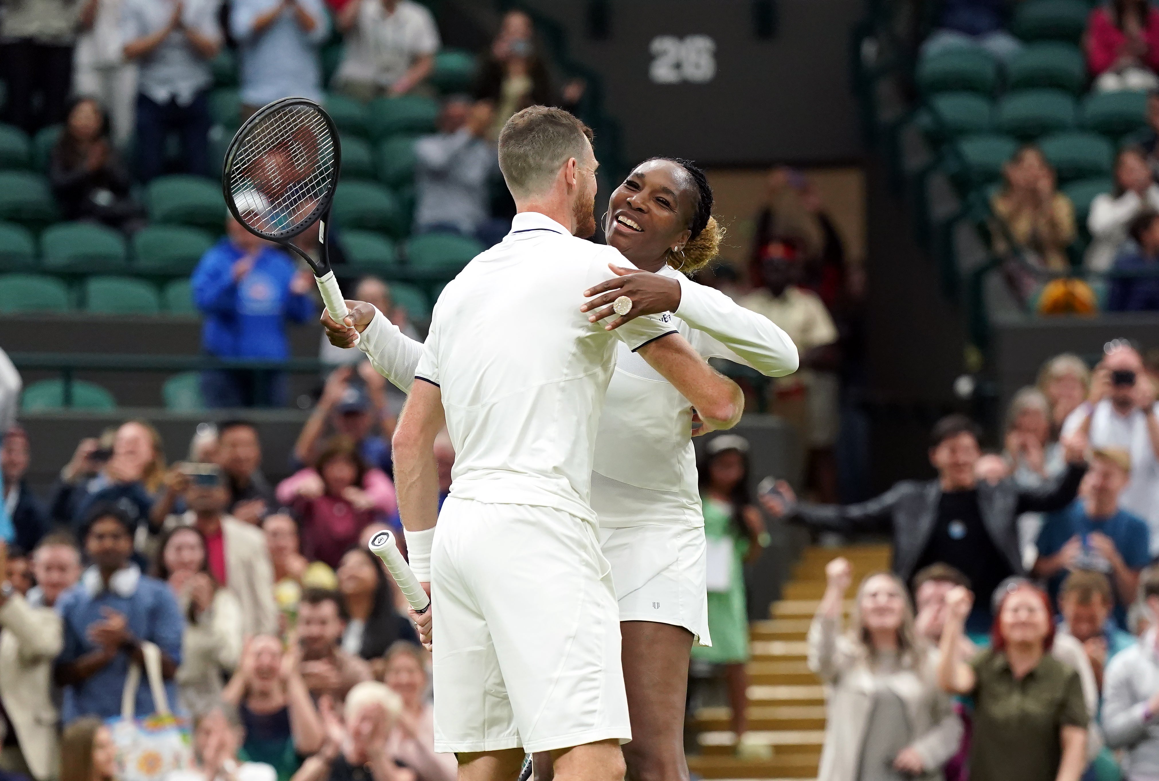 Jamie Murray and Venus Williams celebrate victory (Zac Goodwin/PA)