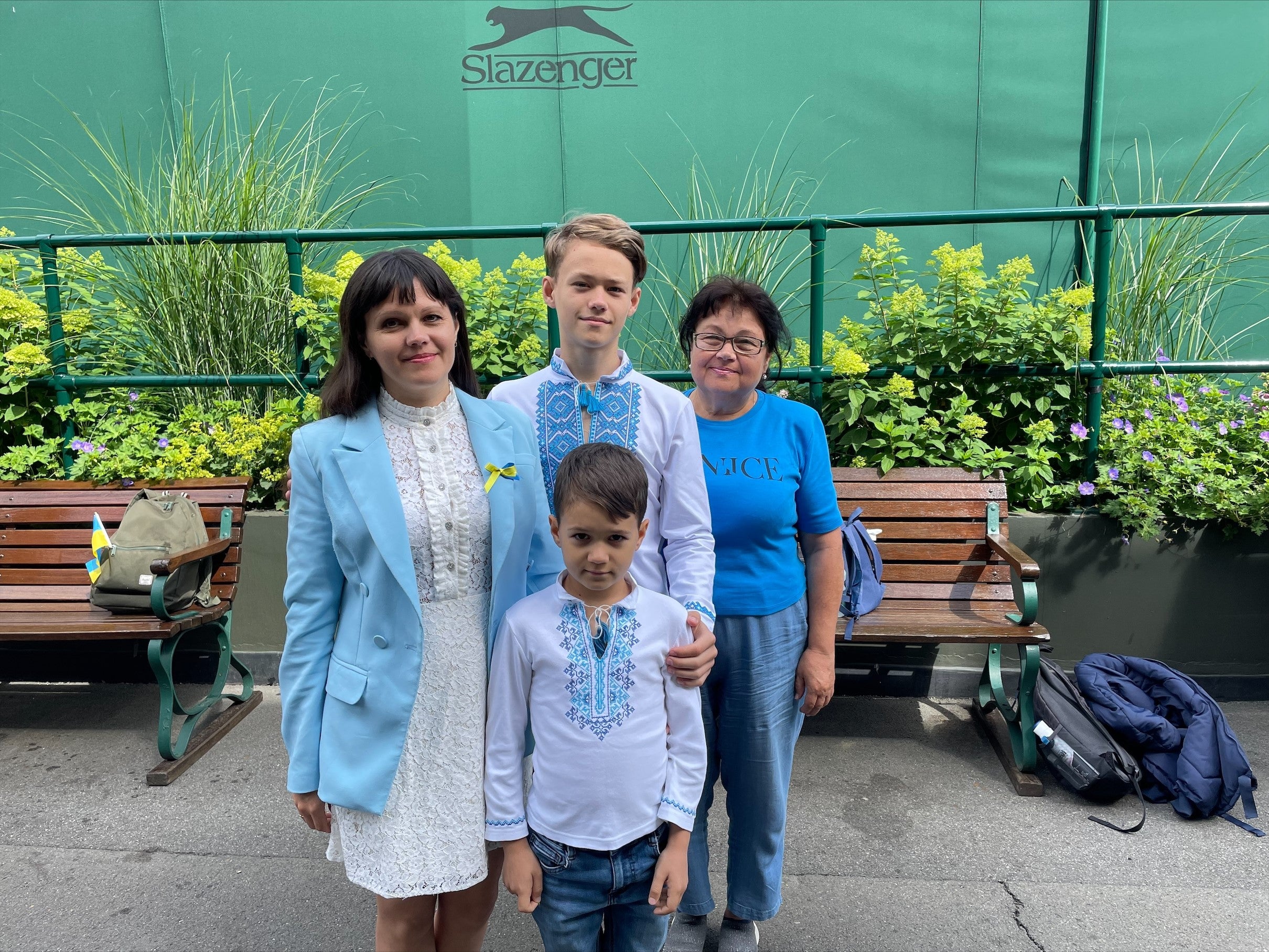 Ukrianian refugees Kateryna Sokol, left, with her mother Zinaida and sons Ivan and Anton at Wimbledon (Laura Parnaby/PA)