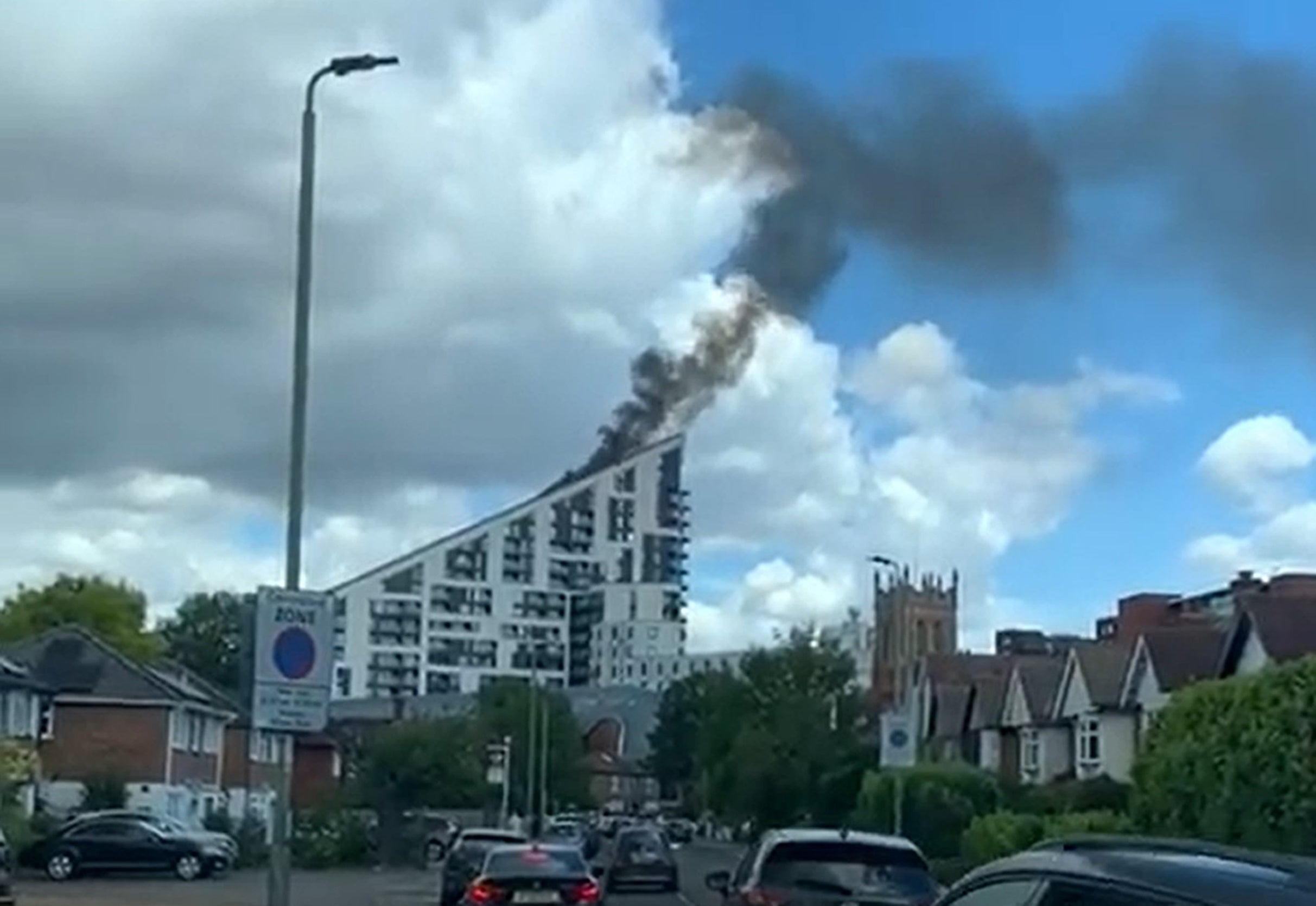 Flumes of smoke could be seen streaming from the building’s roof