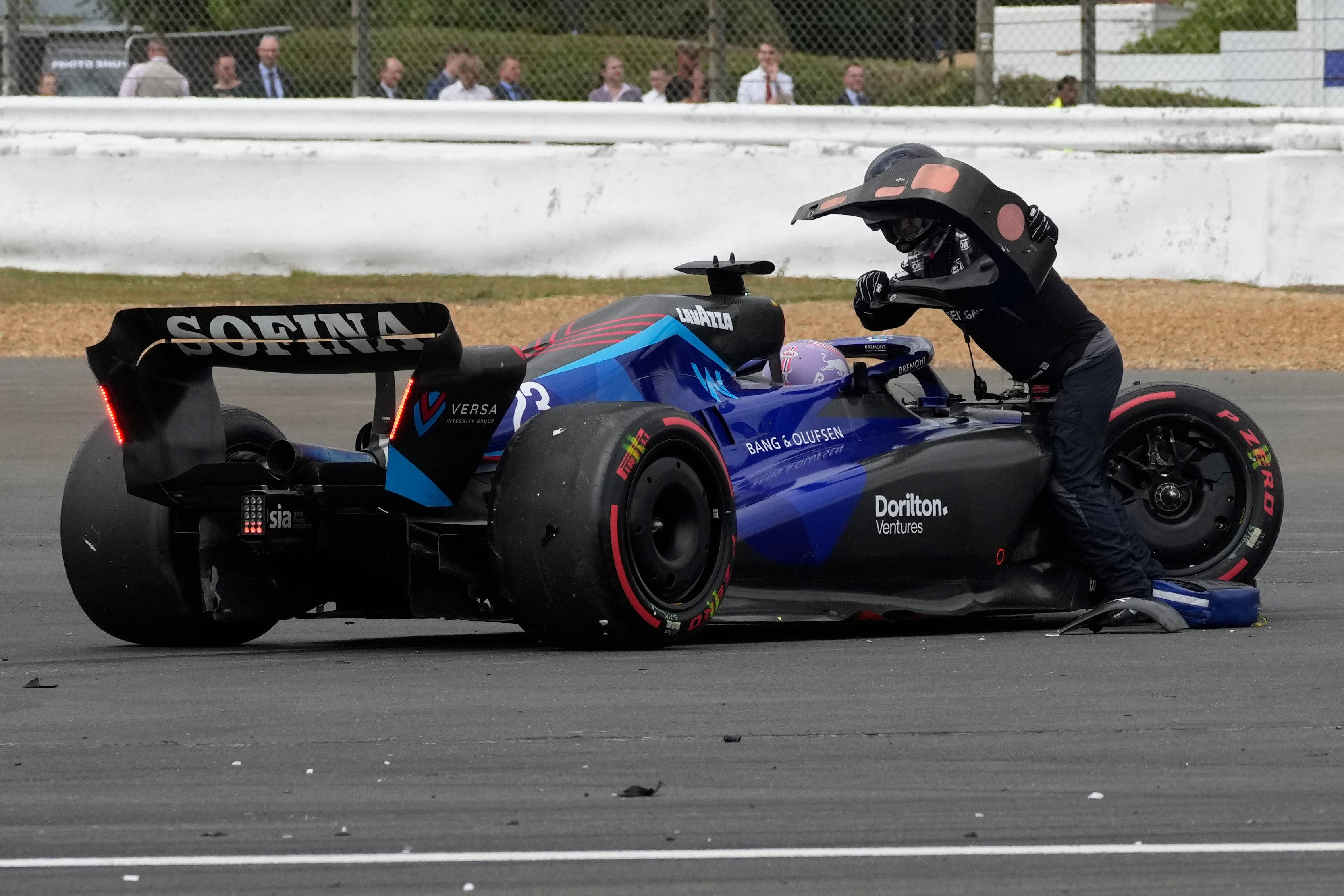 Williams driver Alex Albon is helped from his damaged car (Matt Dunham/AP).