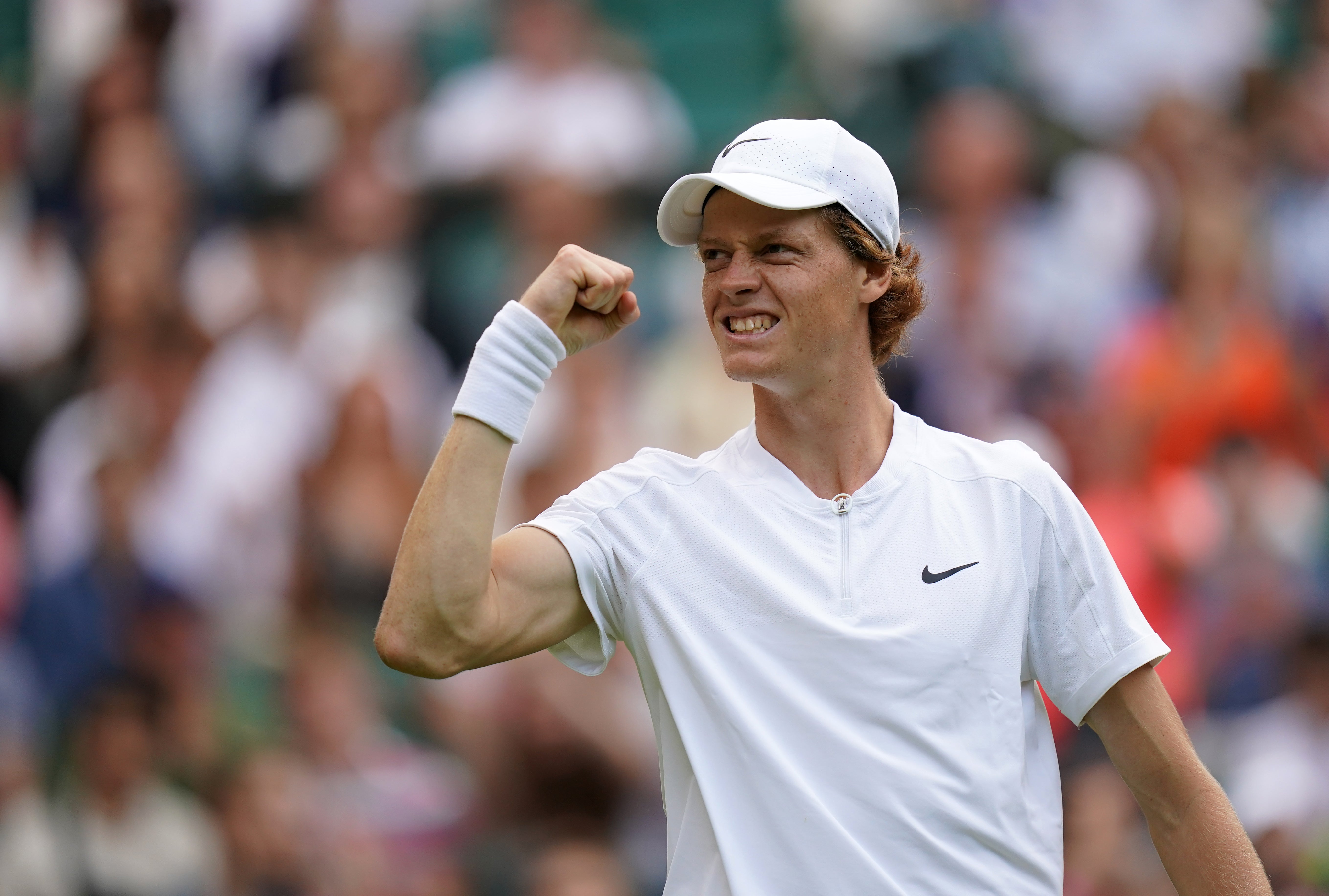 Jannik Sinner celebrates after he beat Carlos Alcaraz in the fourth round at Wimbledon (Adam Davy/PA)