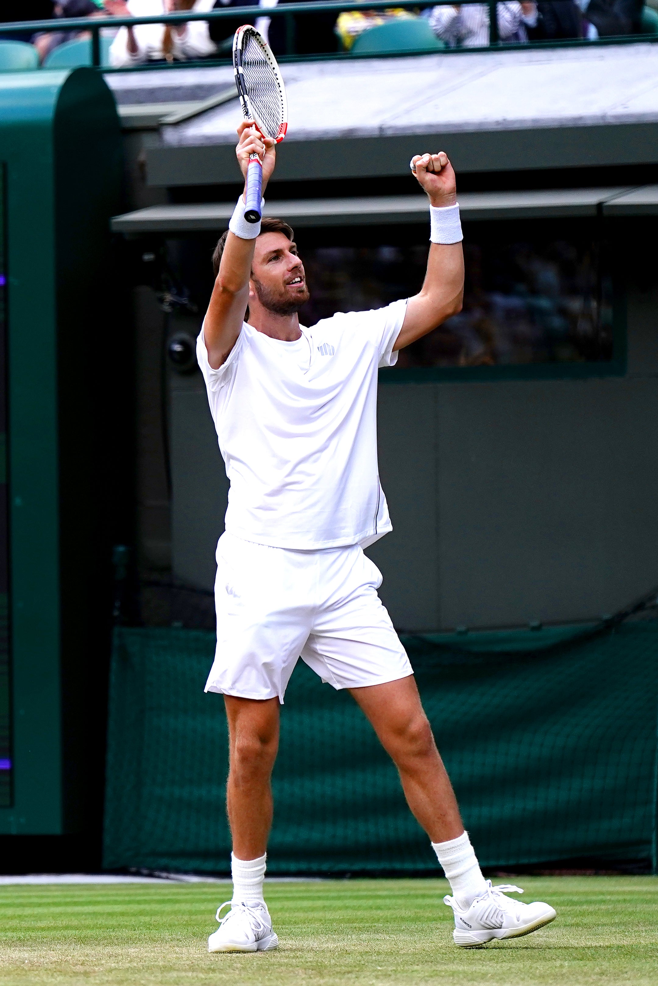 Cameron Norrie celebrates winning his Gentlemen’s Singles fourth round match against Tommy Paul on court 1 during day seven of the 2022 Wimbledon Championships at the All England Lawn Tennis and Croquet Club, Wimbledon. Picture date: Sunday July 3, 2022.