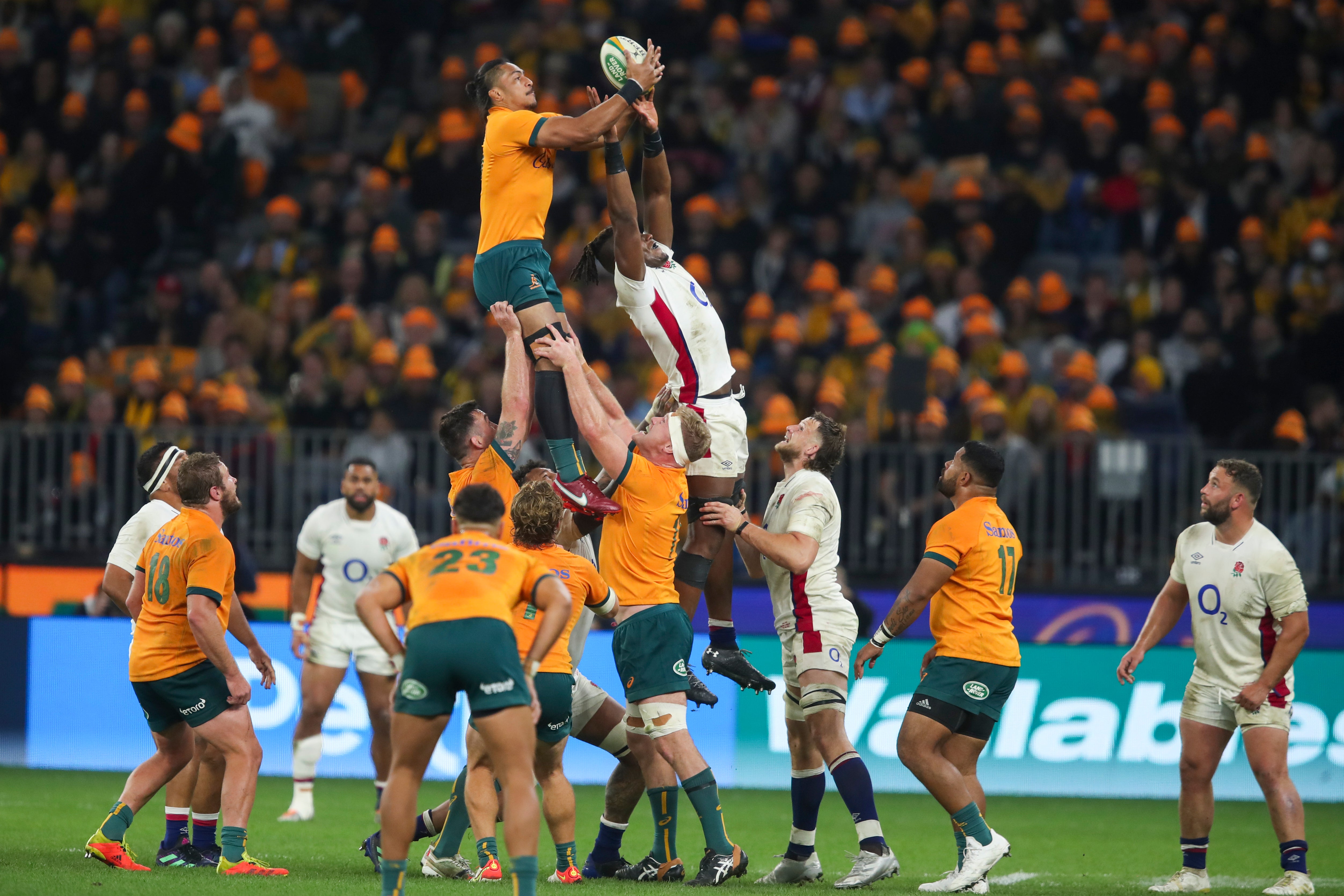 Australia’s Pete Samu, top left, leaps against England’s Maro Itoje (Gary Day/AP)