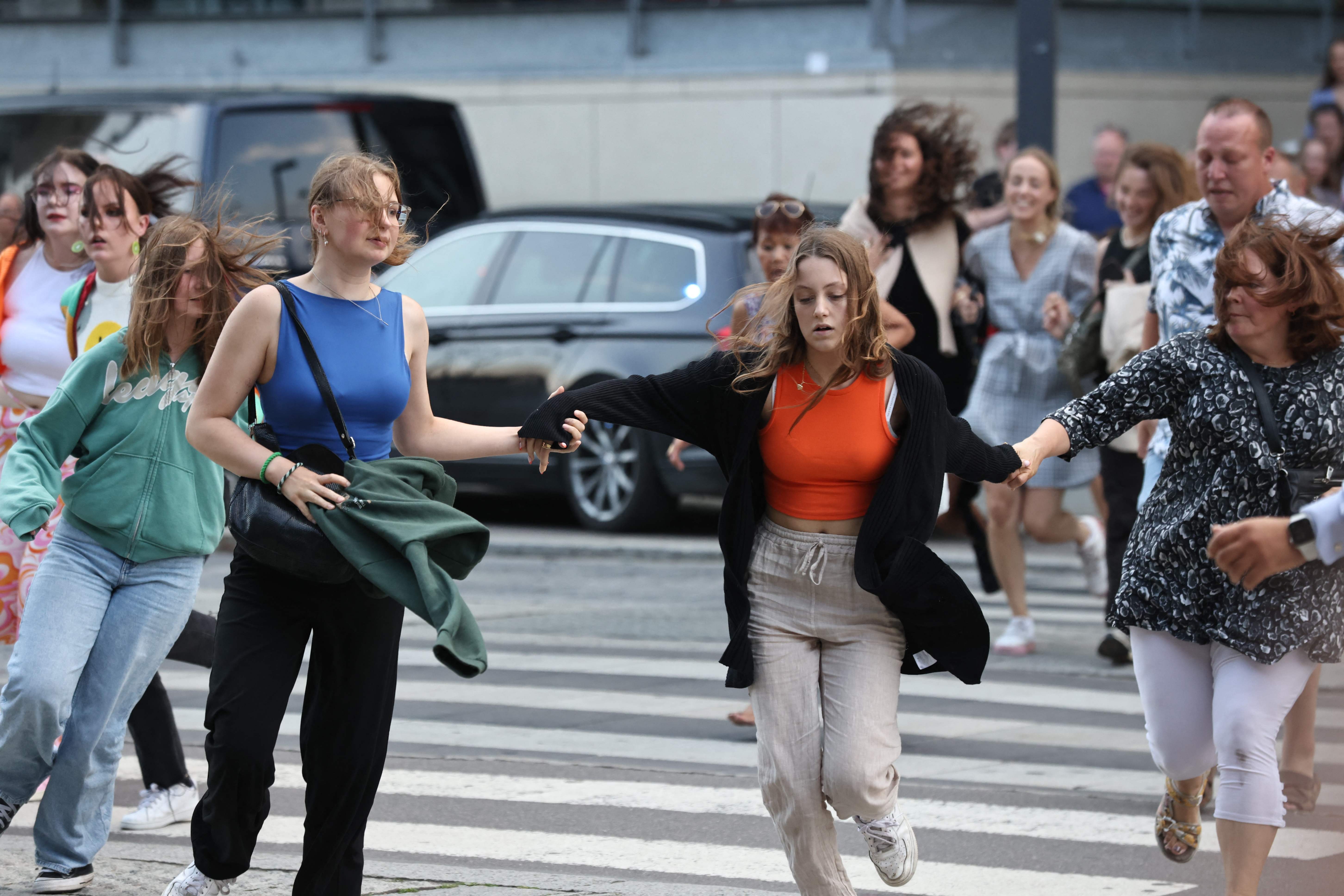 Shoppers run from a shooting at Field's mall in Copenhagen