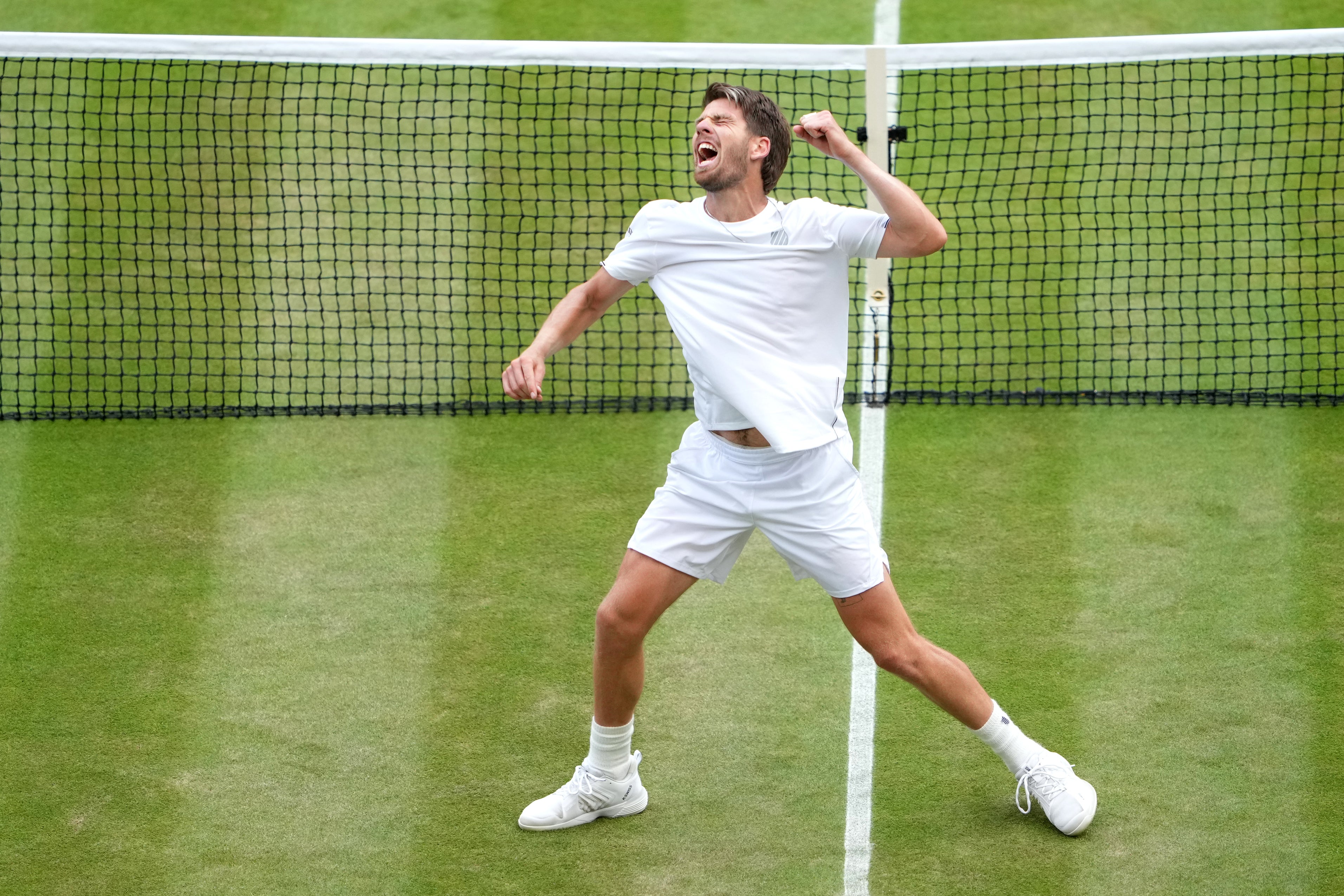 Cameron Norrie celebrates winning his Gentlemen’s Singles fourth round match against Tommy Paul on court 1 during day seven of the 2022 Wimbledon Championships at the All England Lawn Tennis and Croquet Club, Wimbledon. Picture date: Sunday July 3, 2022.