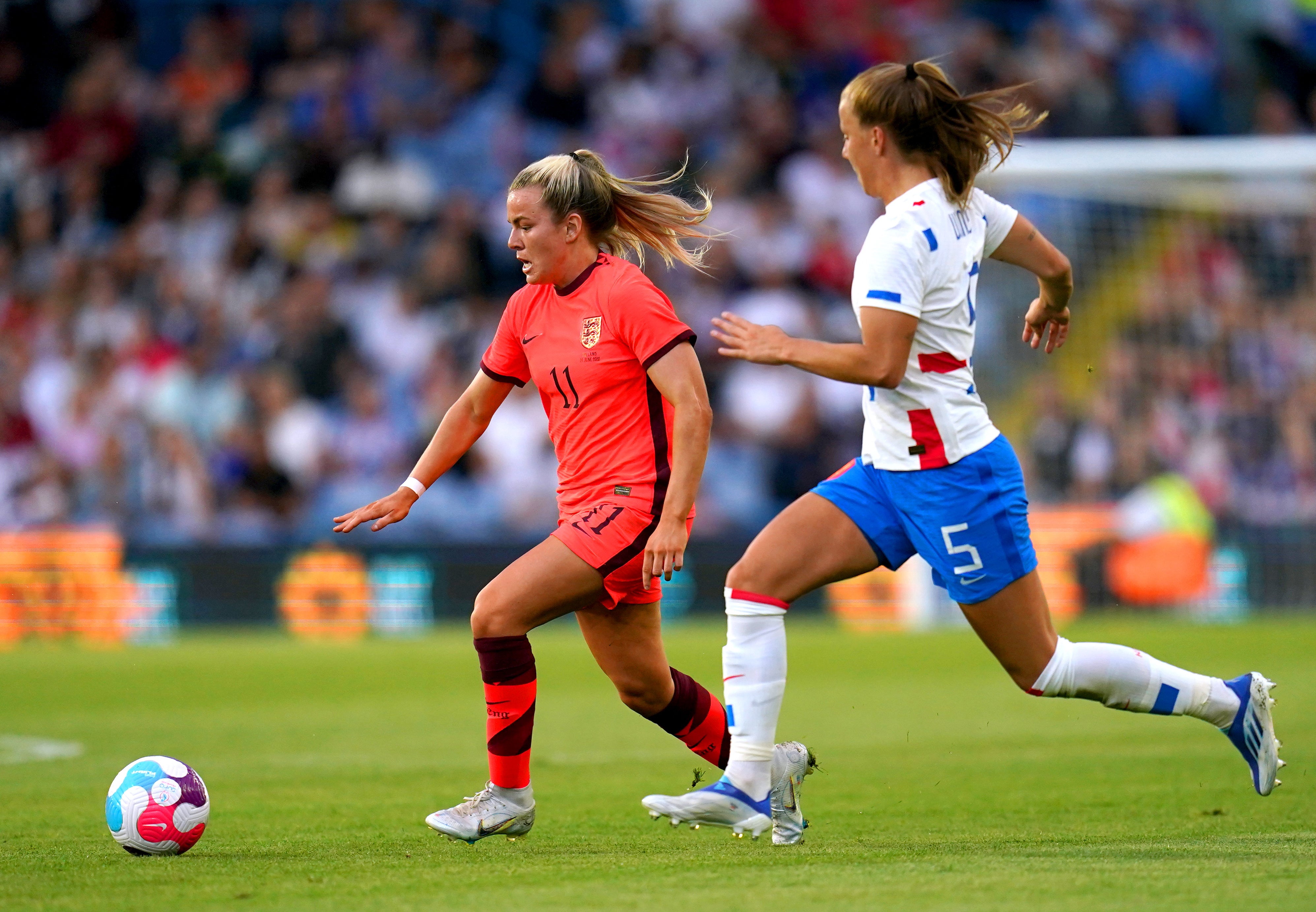 Lauren Hemp, left, has found her scoring boots for England (Nick Potts/PA)
