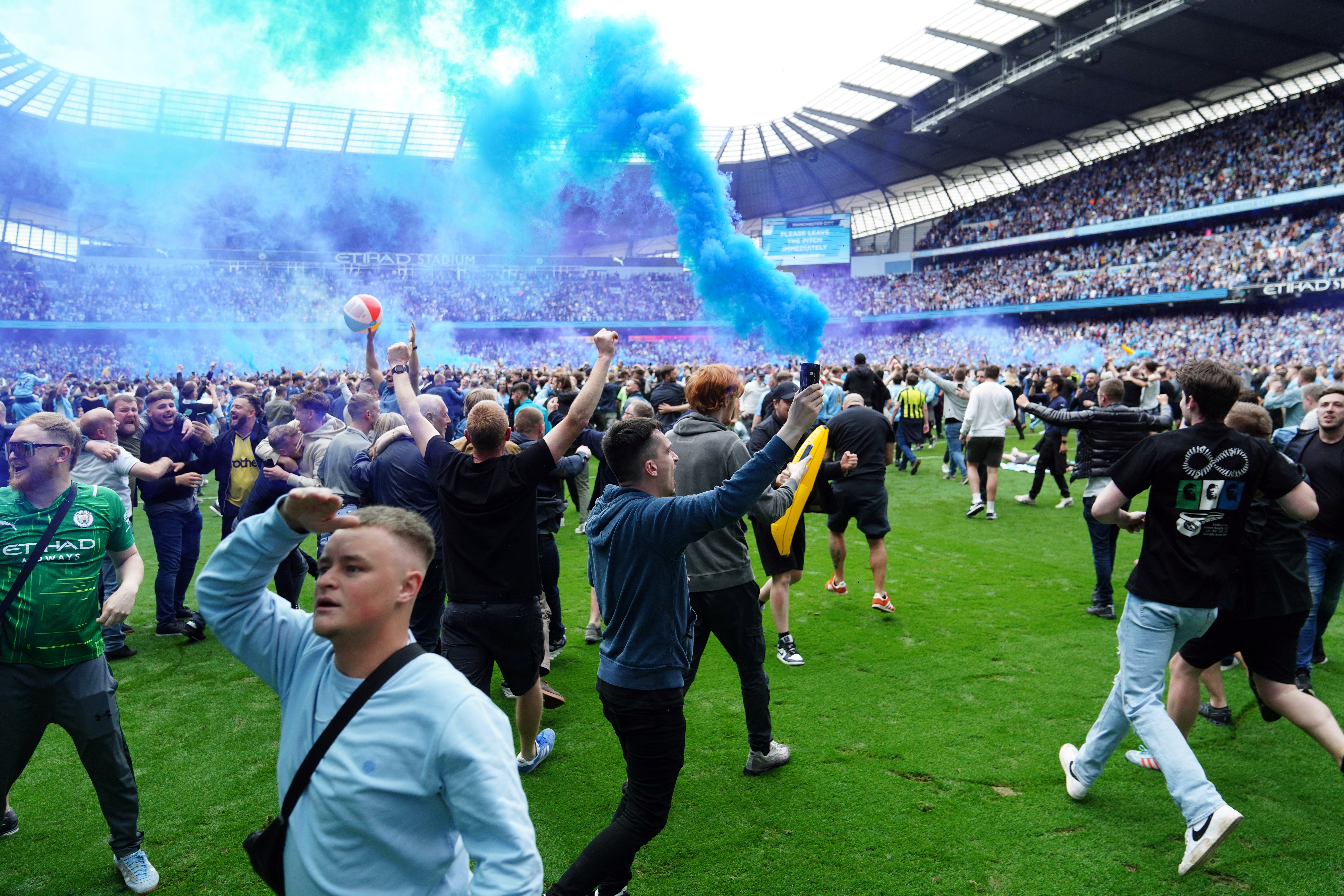 Barriers in safe standing areas make pitch invasions more difficult, an independent report on the safe standing pilot concluded (Martin Rickett/PA)