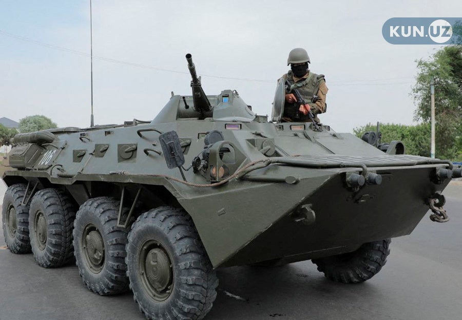 An Uzbek service member guards a street in Nukus, capital of the northwestern Karakalpakstan region