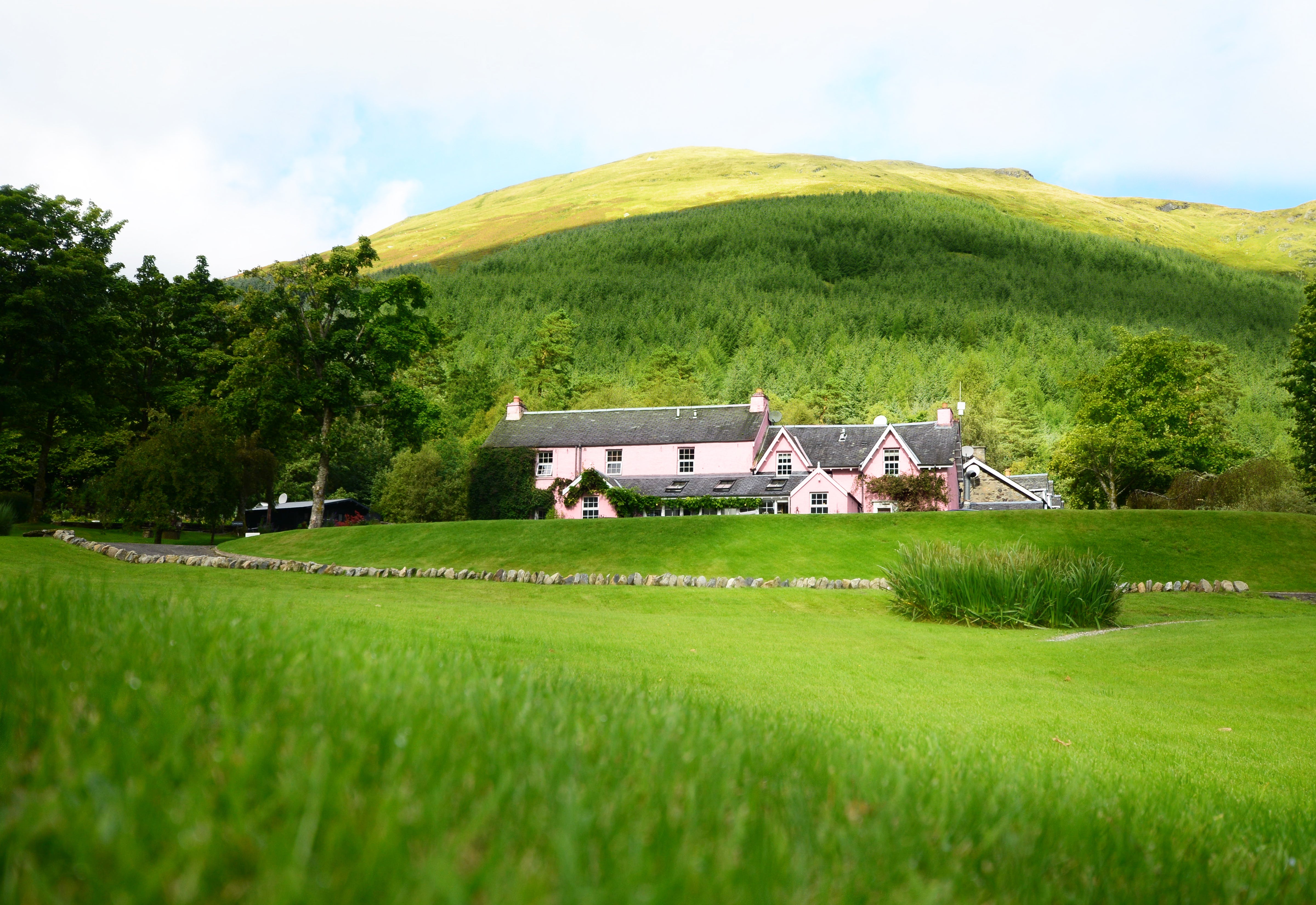 You can spend the night right in front of those rolling green hills