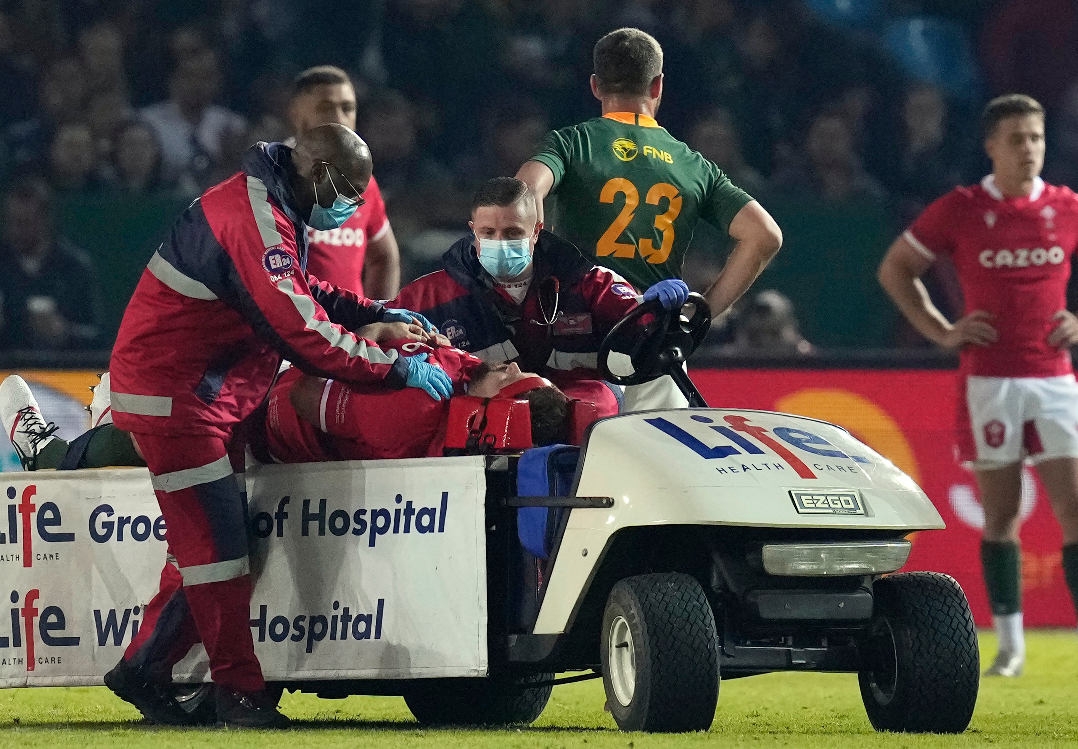 Tomas Francis is taken from the field after being hurt in the first Test against South Africa (Themba Hadebe/AP)