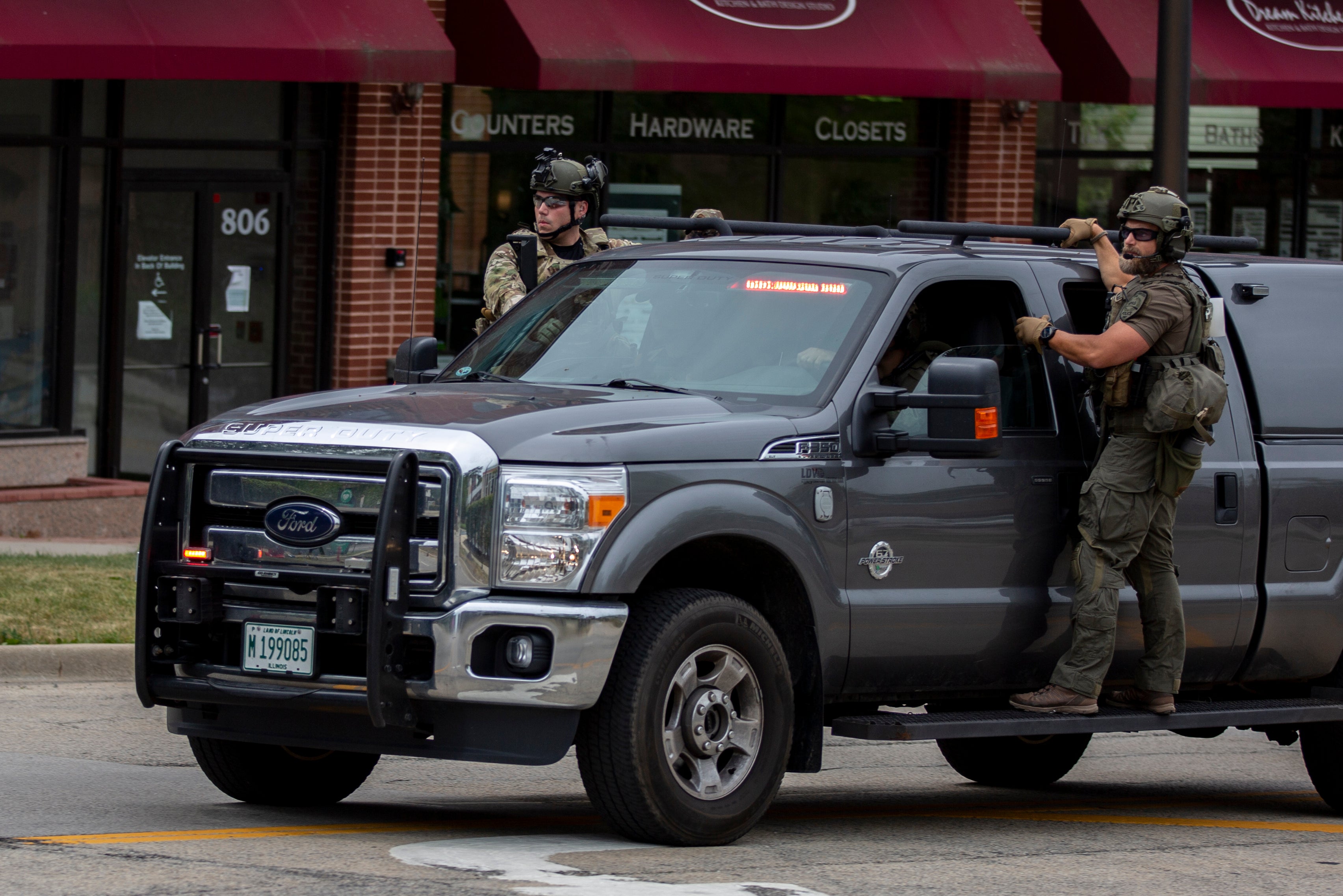 Police in Highland Park respond to a mass shooting at a July 4th parade