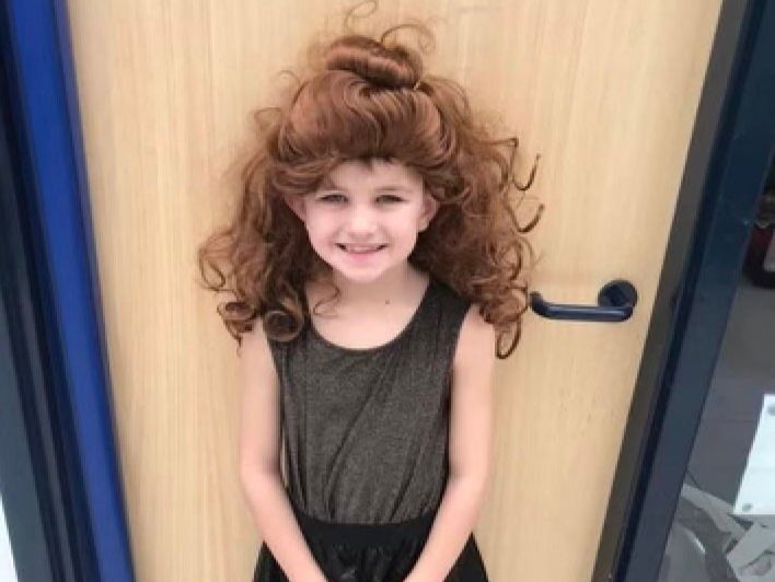 Zac dressed up as his mother on Superhero Day at his primary school