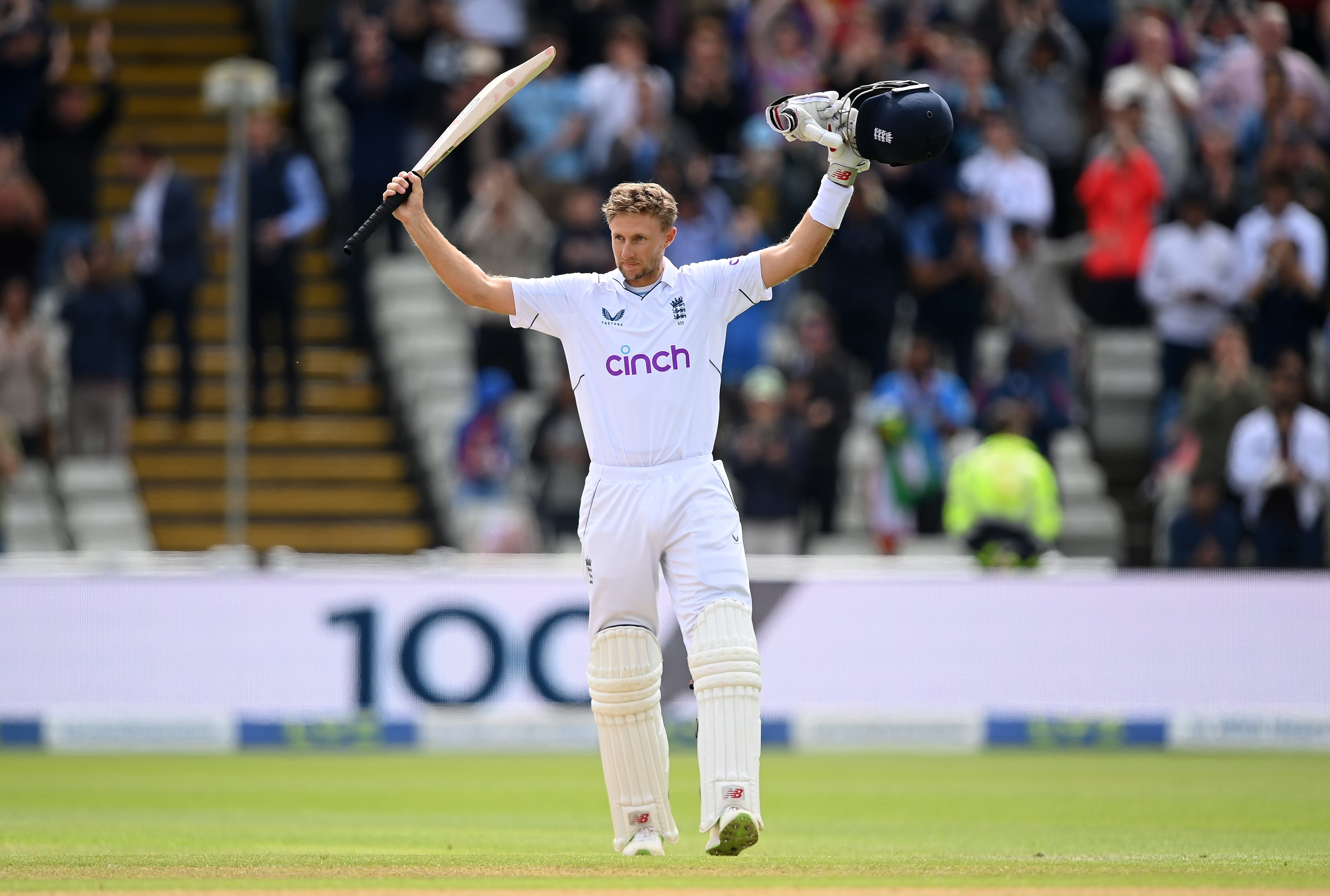 Joe Root raises his bat after hitting another century