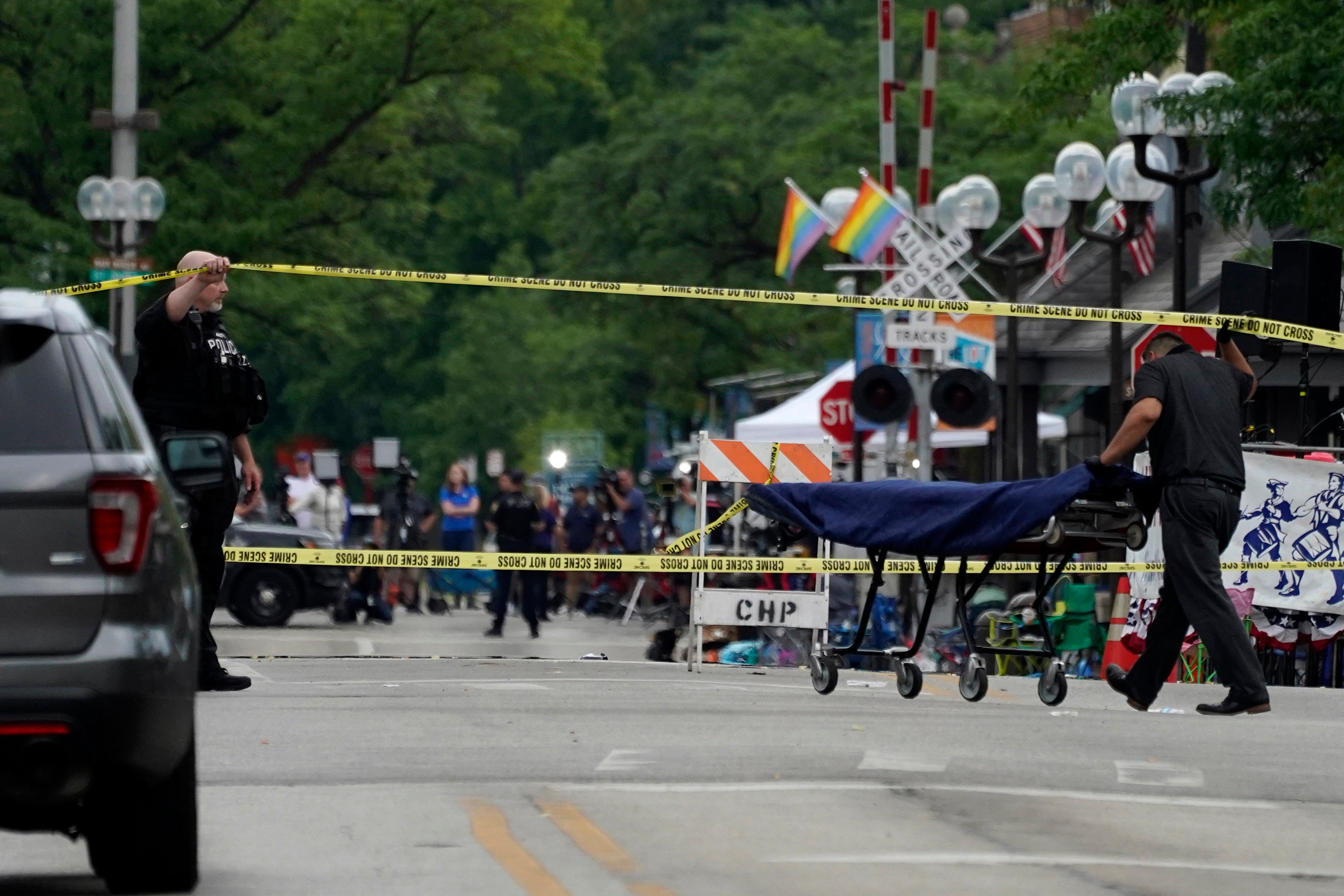 Families fled for their lives after a gunman opened fire at the Highland Park July 4th parade