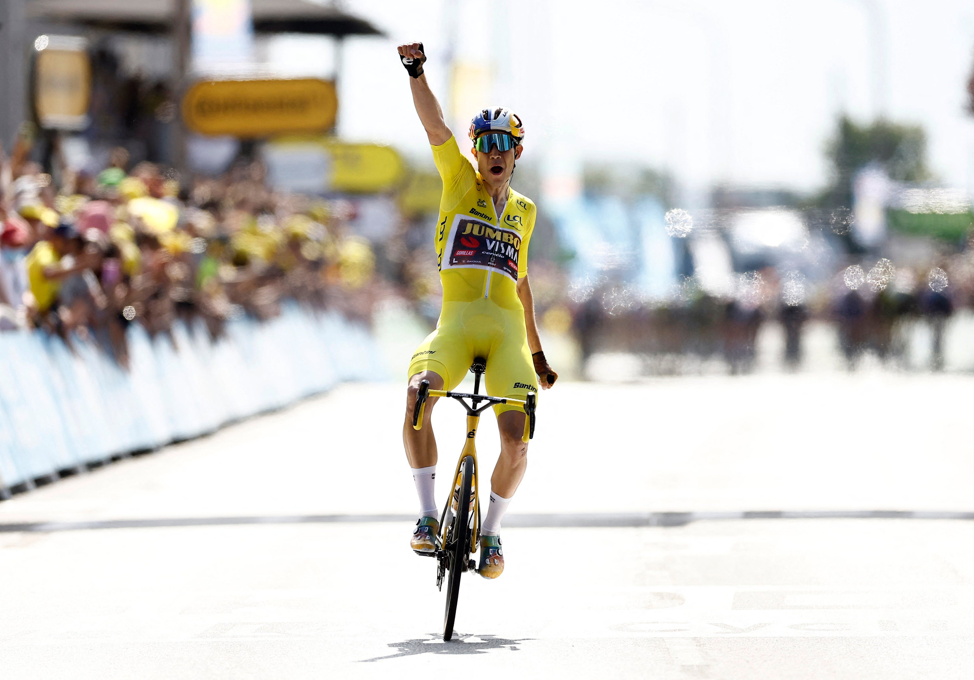 Wout van Aert celebrates winning stage four in Calais