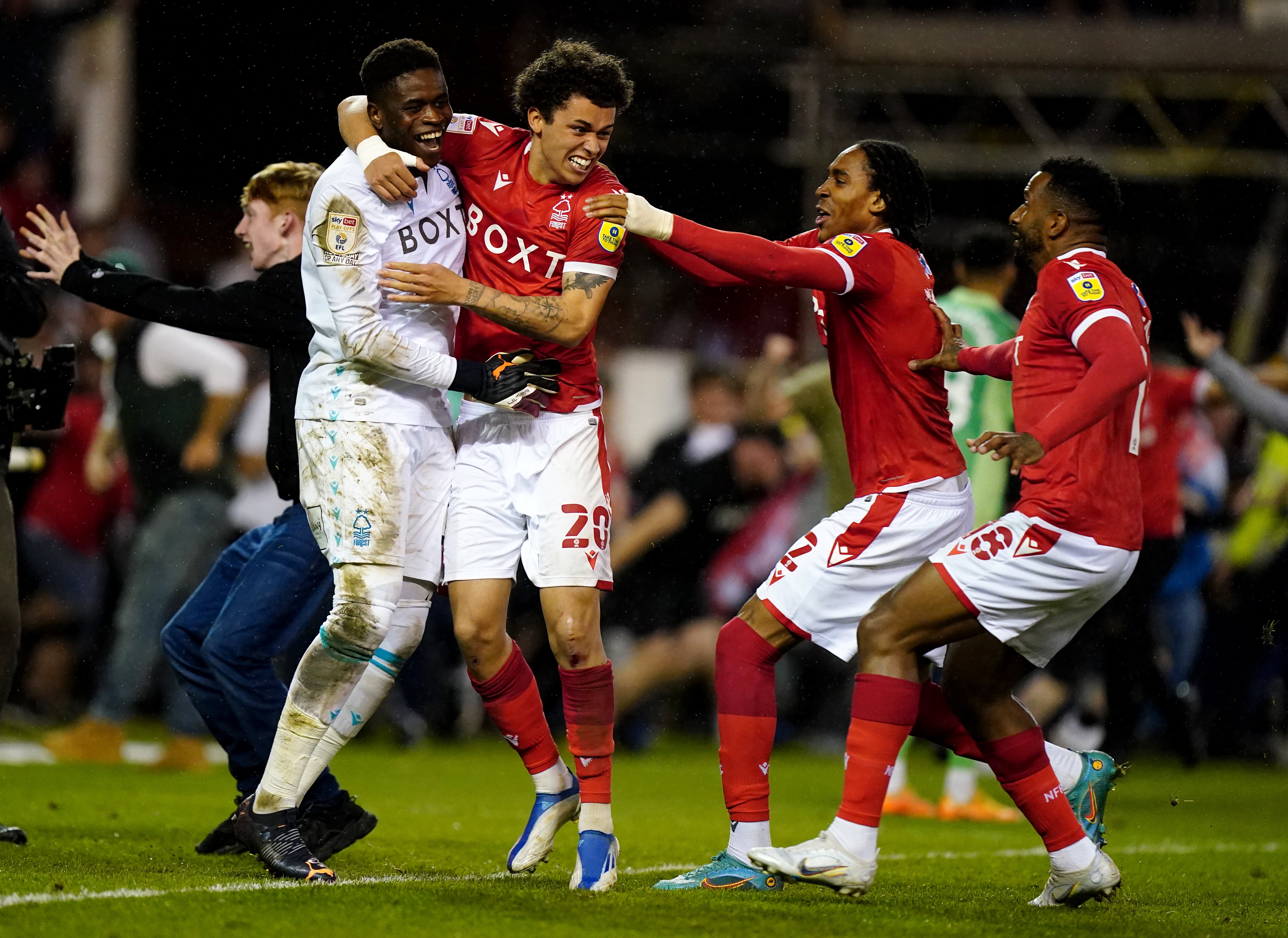 (L-R) Nottingham Forest goalkeeper Brice Samba, Brennan Johnson, Djed Spence and Cafu celebrate reaching the Sky Bet Championship play off final after victory over Sheffield United (Mike Egerton/PA)