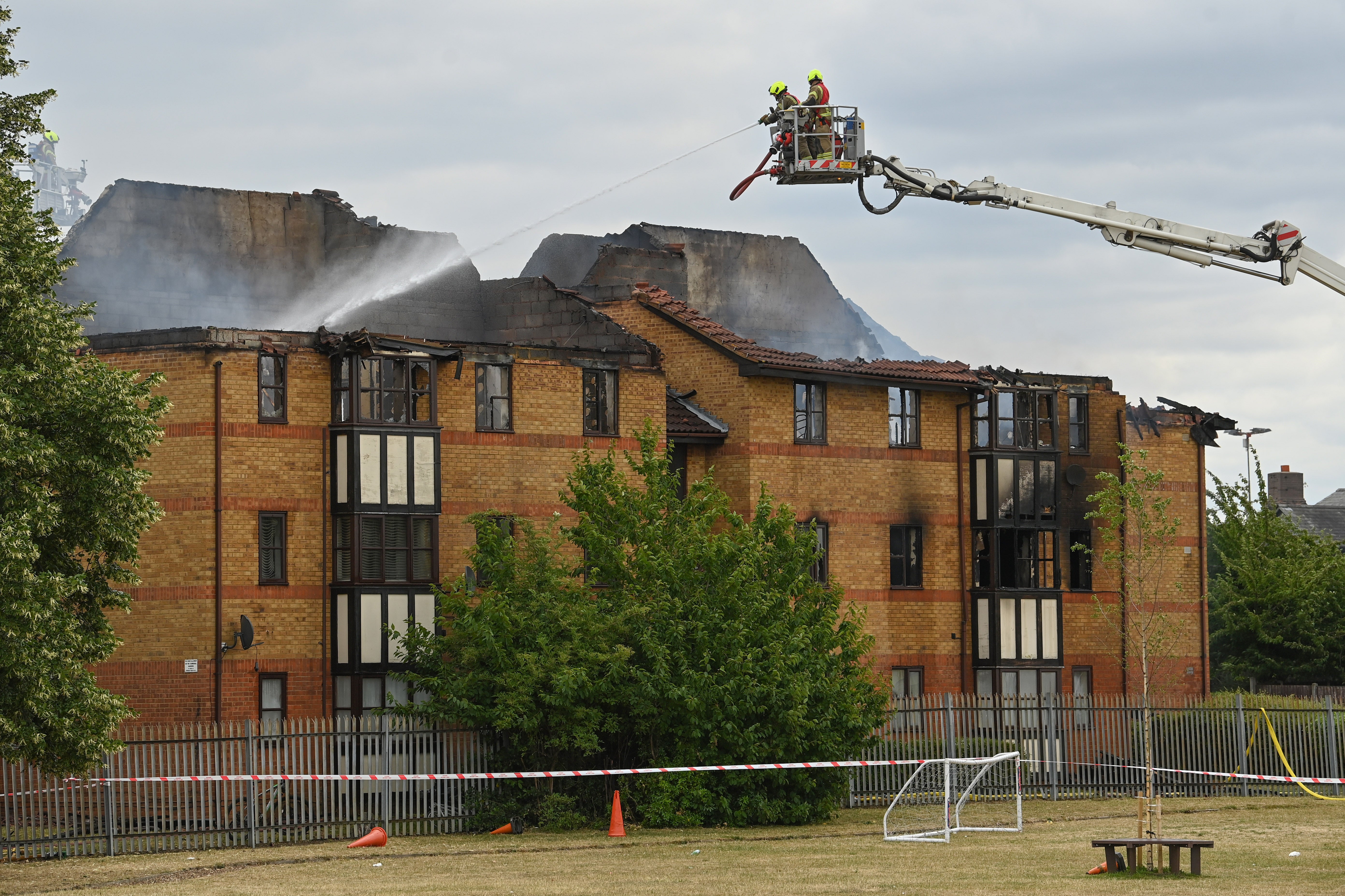 Firefighters at the scene in Redwood Grove, Bedford (Doug Peters/PA)