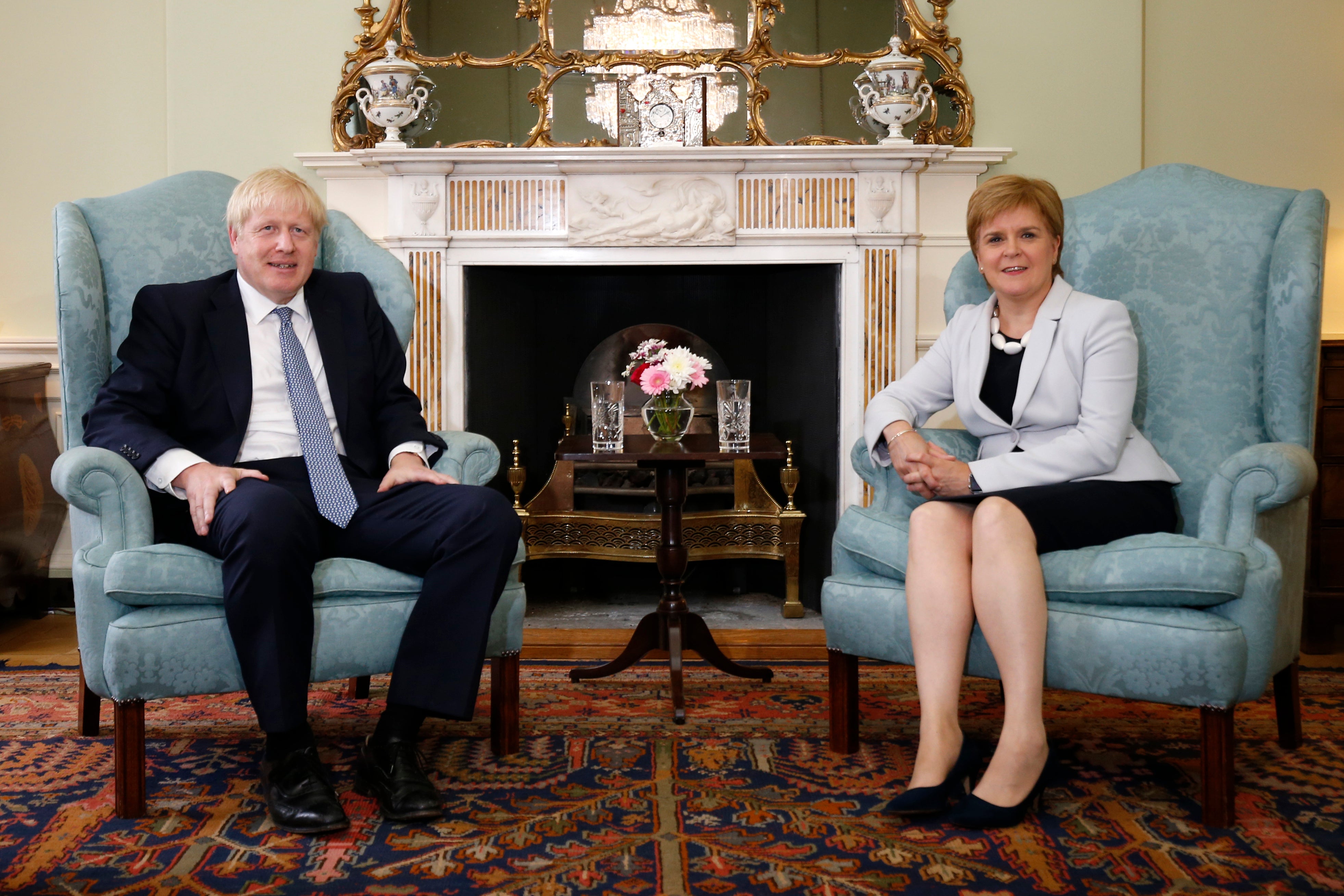 First Minister Nicola Sturgeon with Prime Minister Boris Johnson (PA)